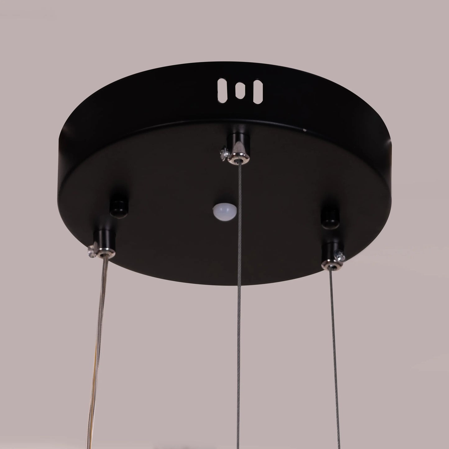 Stylish Meet And Greet Chandelier with five adjustable heads in a modern living room.