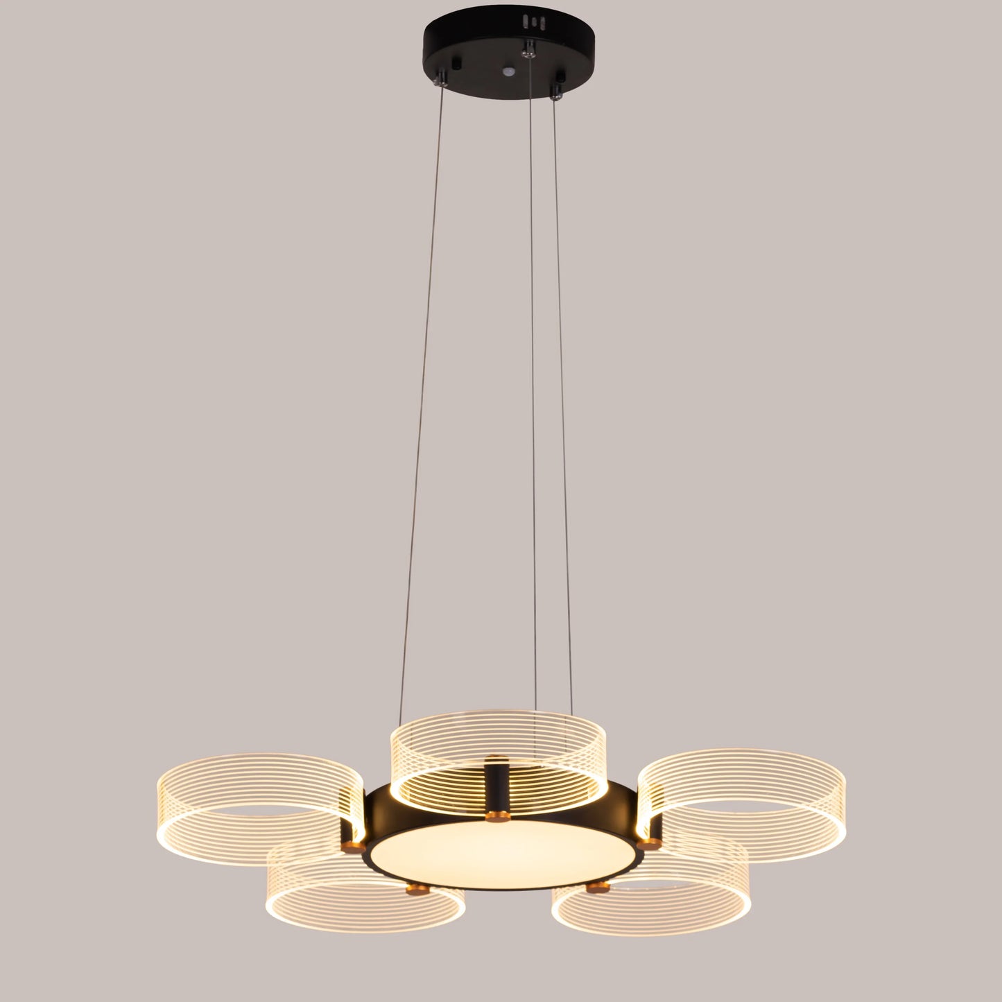 Stylish Meet And Greet Chandelier with five adjustable heads in a modern living room.