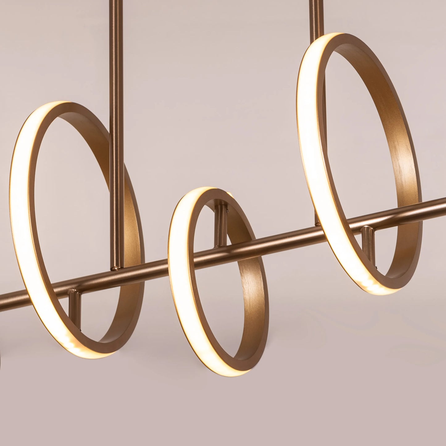 Lifetime To Live Signature Chandelier illuminating a luxurious dining room.