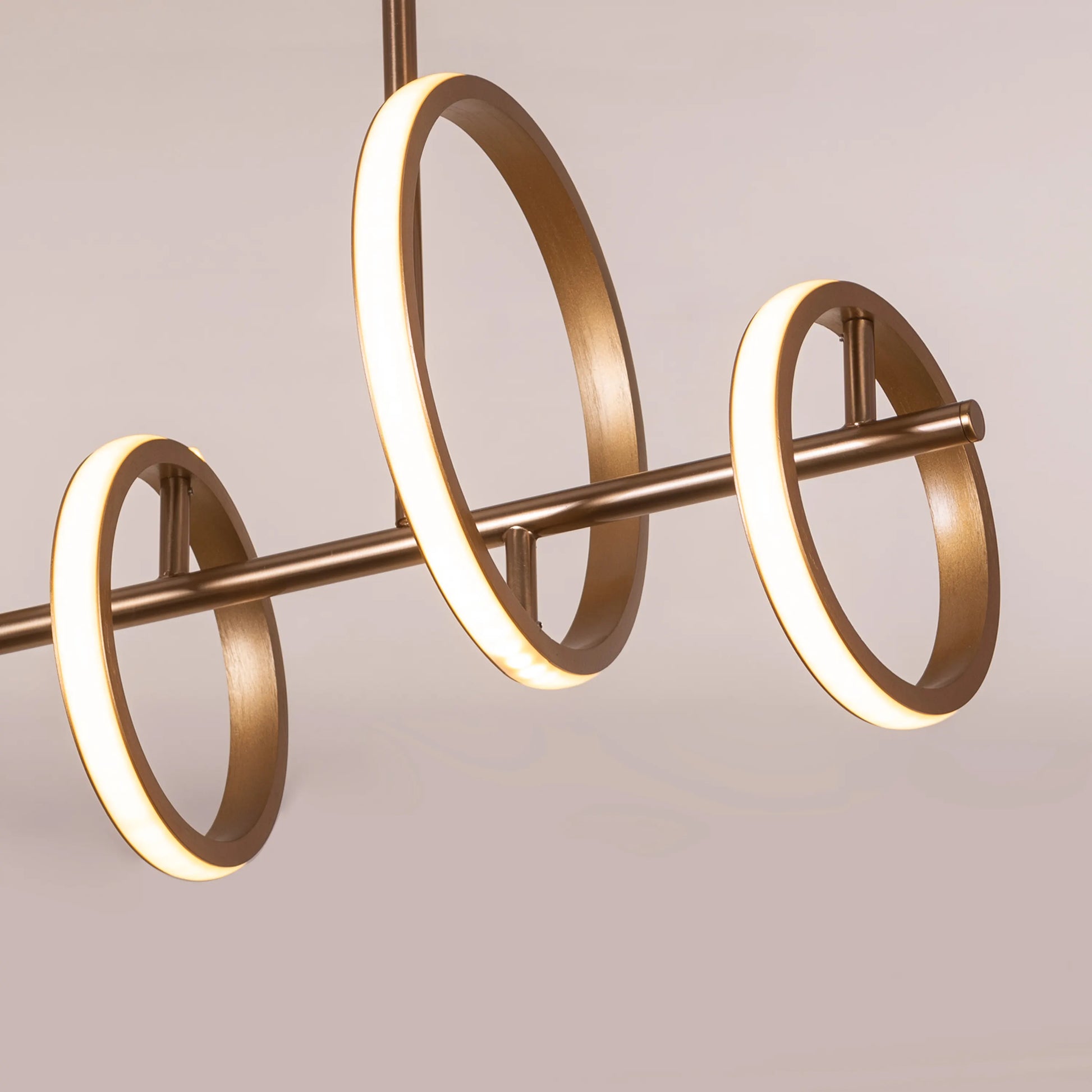 Lifetime To Live Signature Chandelier illuminating a luxurious dining room.