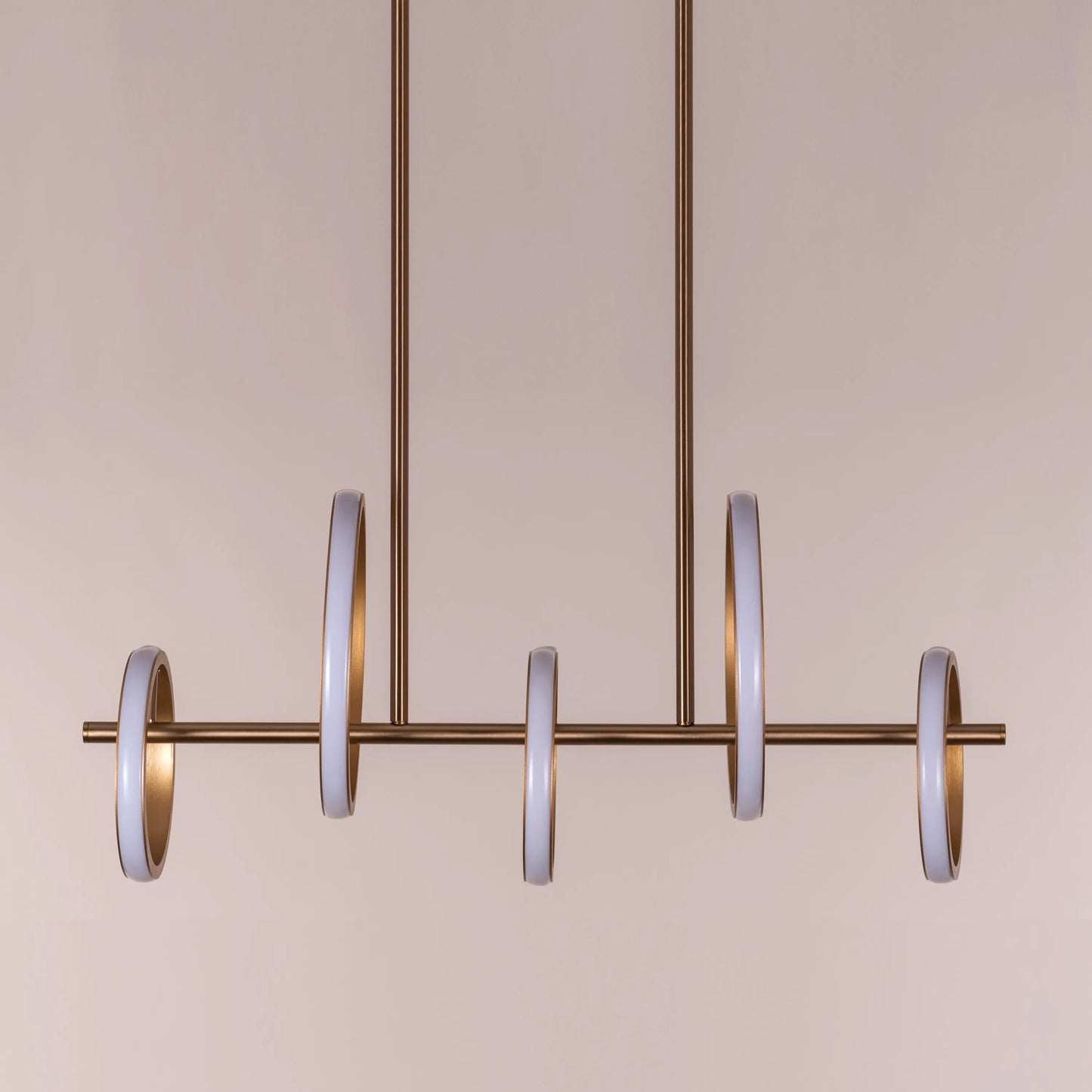 Lifetime To Live Signature Chandelier illuminating a luxurious dining room.