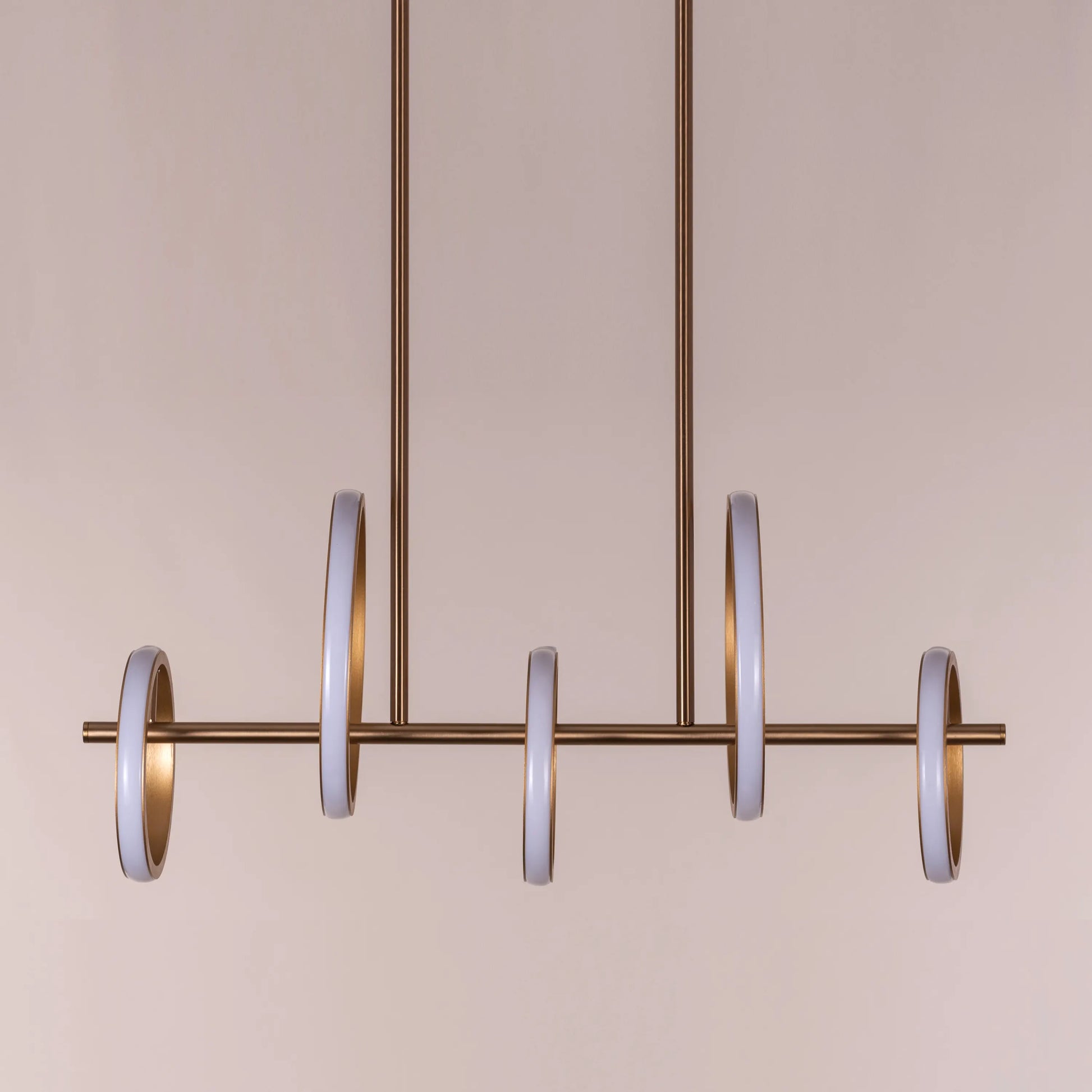 Lifetime To Live Signature Chandelier illuminating a luxurious dining room.