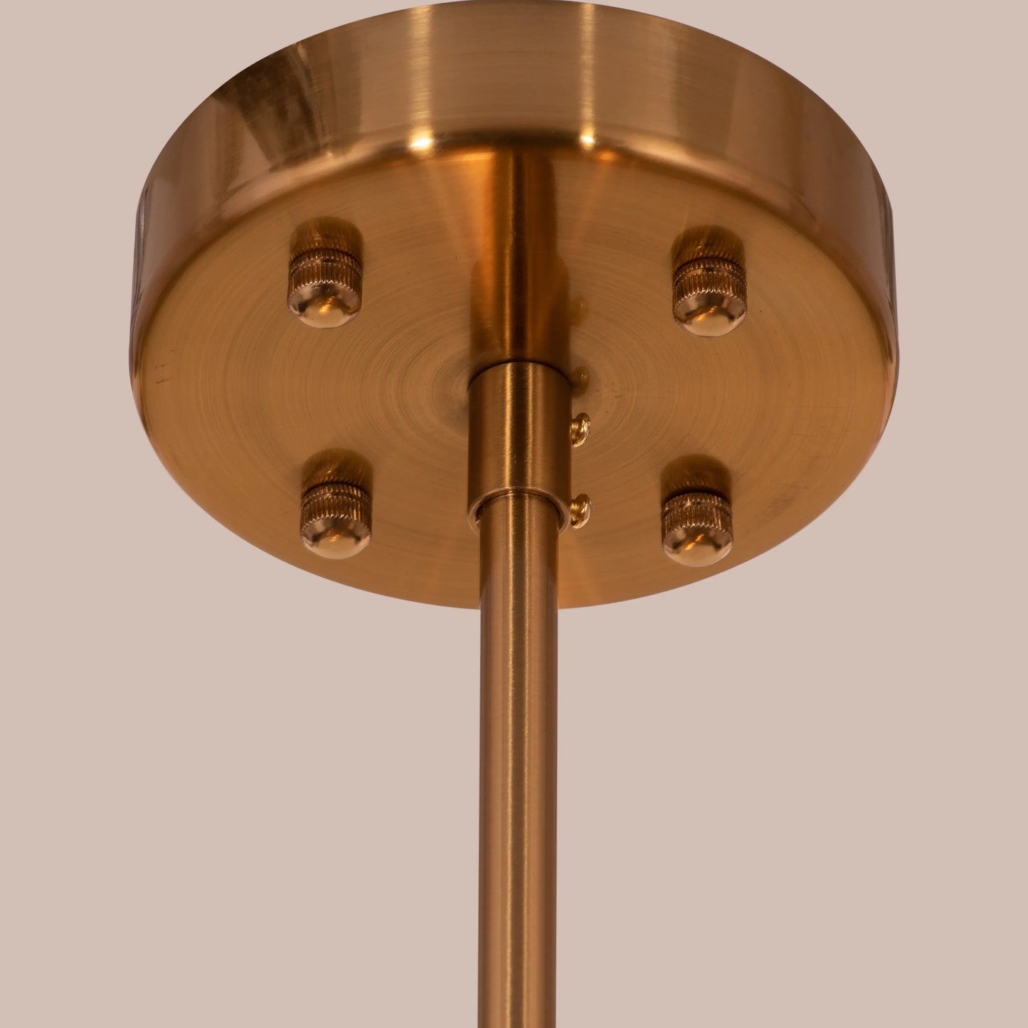 Melrose Place gold chandelier with tiered crystal drops illuminating a luxurious dining room