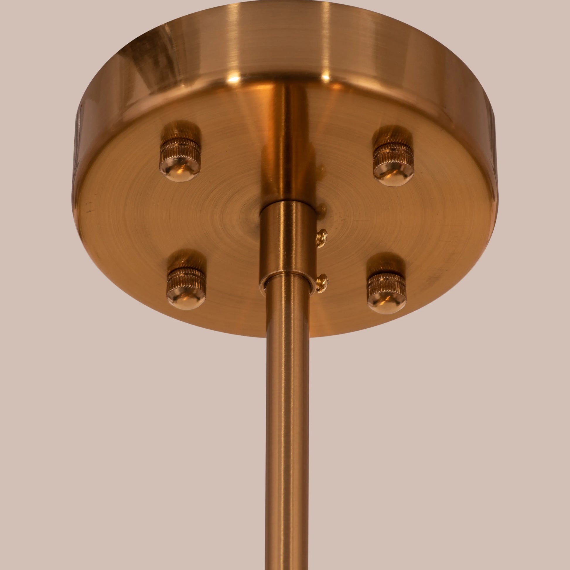 Melrose Place gold chandelier with tiered crystal drops illuminating a luxurious dining room