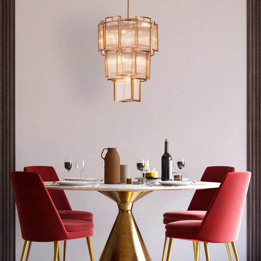 Melrose Place gold chandelier with tiered crystal drops illuminating a luxurious dining room