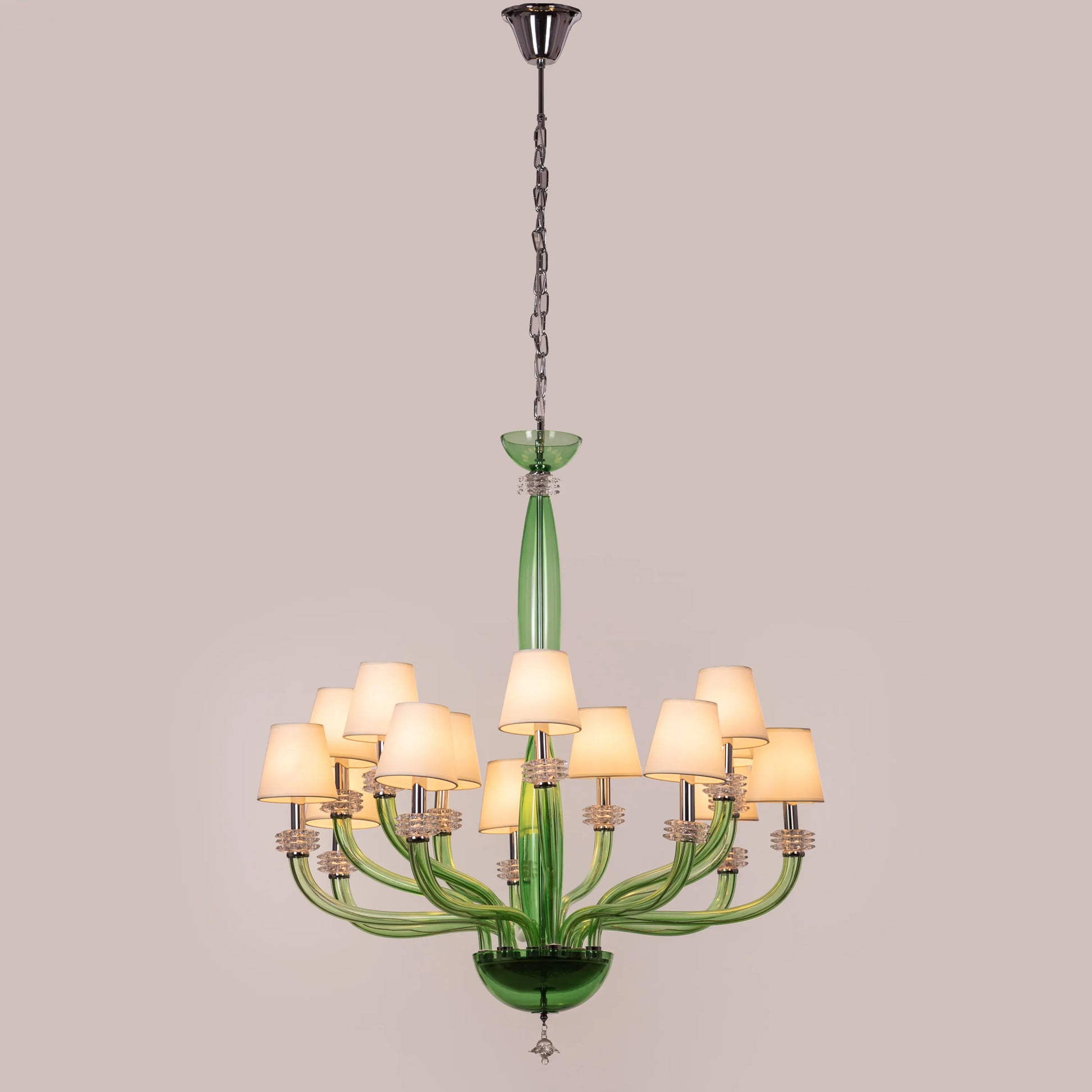 Large green and white glass chandelier with cloud-like forms and warm lighting