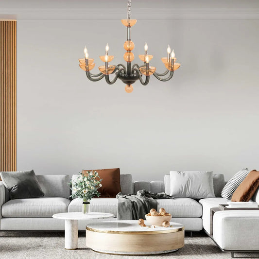 Large "Steps Of Rome" chandelier with tiered green and amber glass elements, dramatically illuminated in a spacious, elegant room.