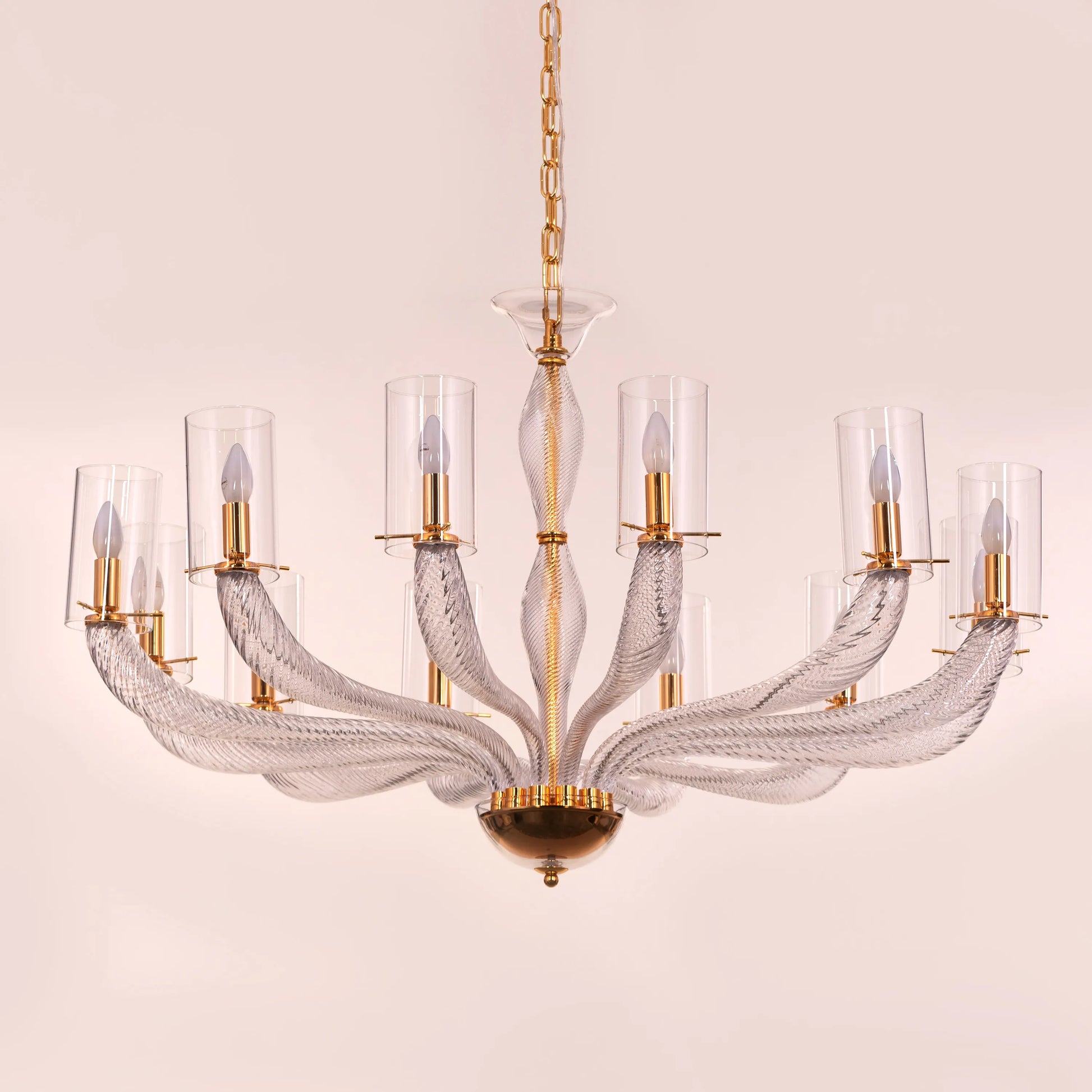 Midnight In Paris large gold glass chandelier illuminating an elegant living room