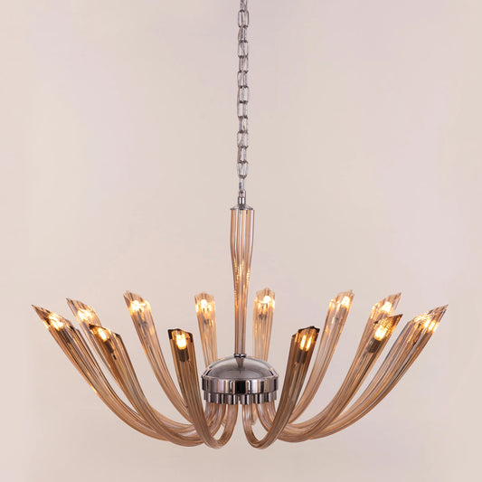 Landslide large brown glass chandelier illuminating a spacious living room with its warm, amber glow