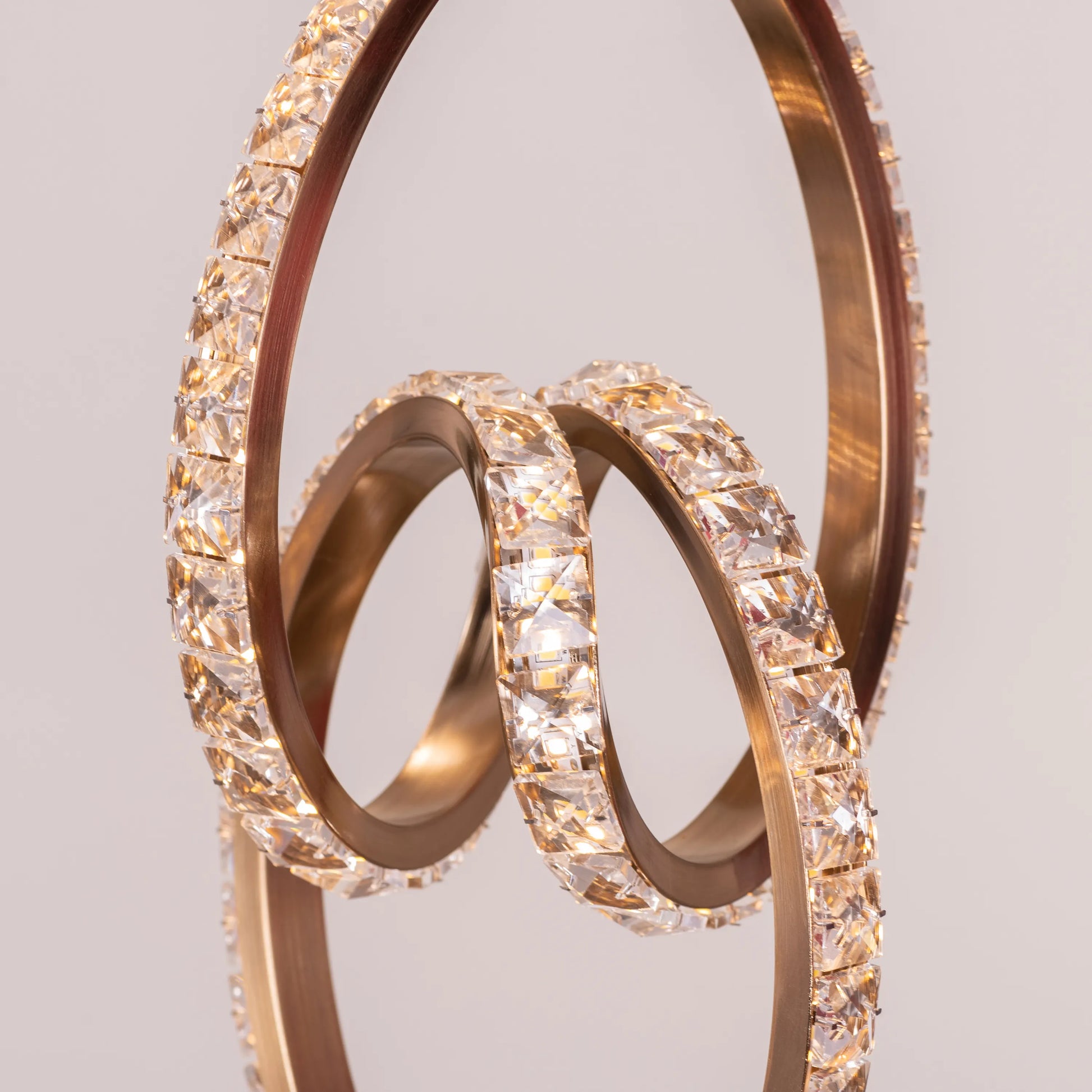 Stunning gold and crystal double-height chandelier with dimmable LED lights