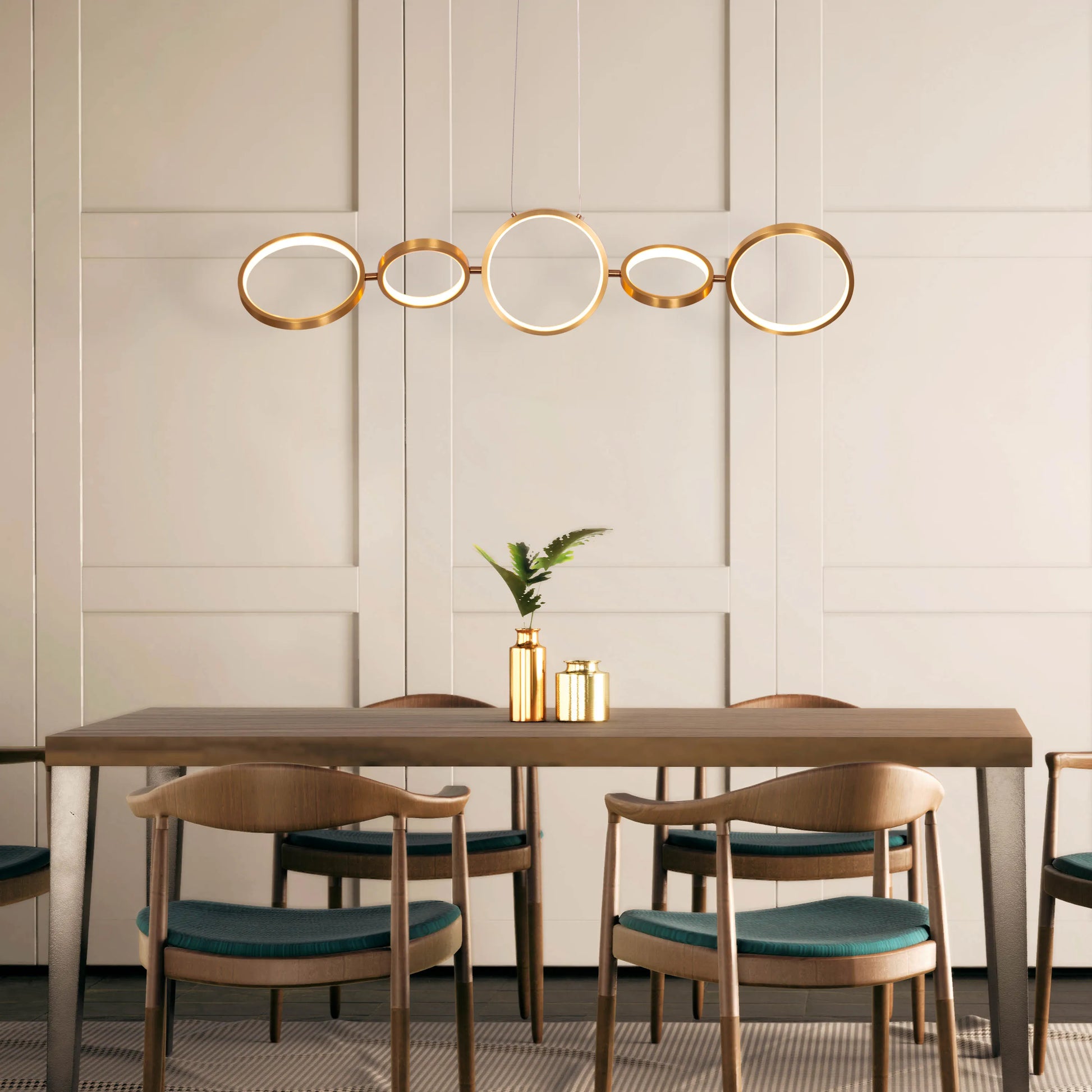 Large gold How We Play chandelier with playful design elements illuminating a luxurious living room