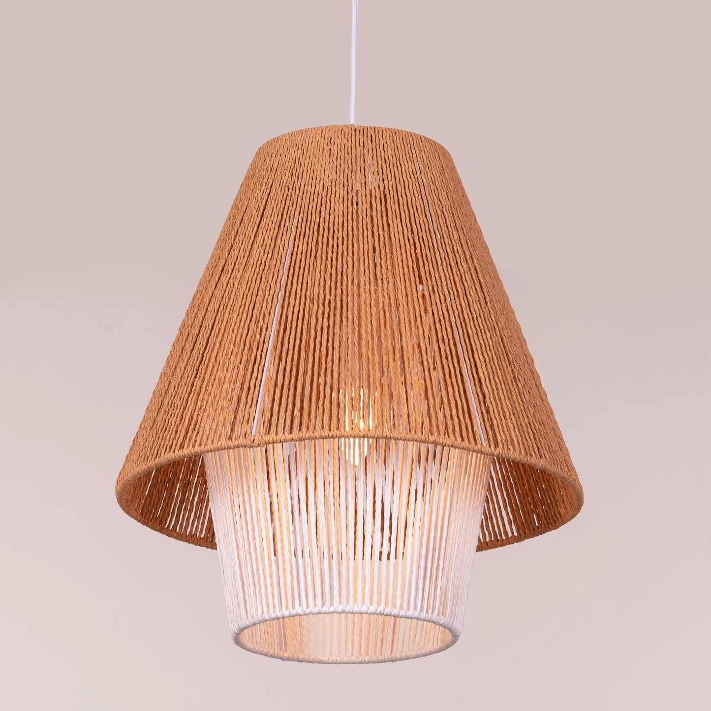 A charming rattan pendant light named 'Say What You Mean,' featuring a woven rattan shade with a bold, open design. The natural fibers create an inviting atmosphere as light filters through, casting playful shadows. This pendant combines bohemian style with a contemporary touch, making it a perfect addition to any space seeking warmth and character.
