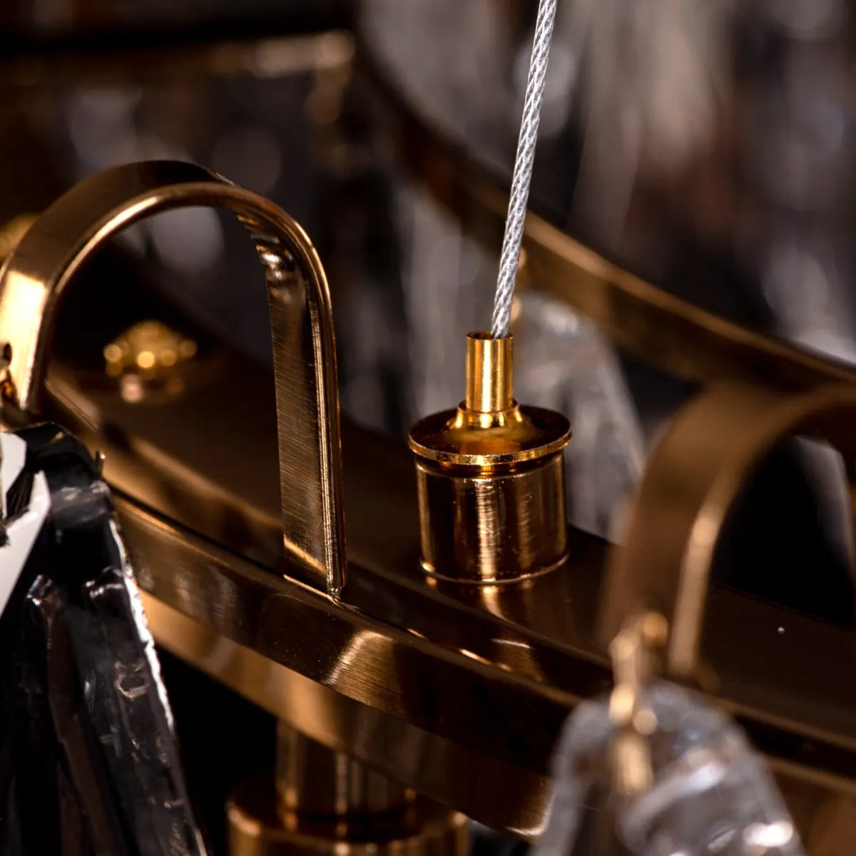 Clear To Me medium gold crystal chandelier illuminating a formal dining room