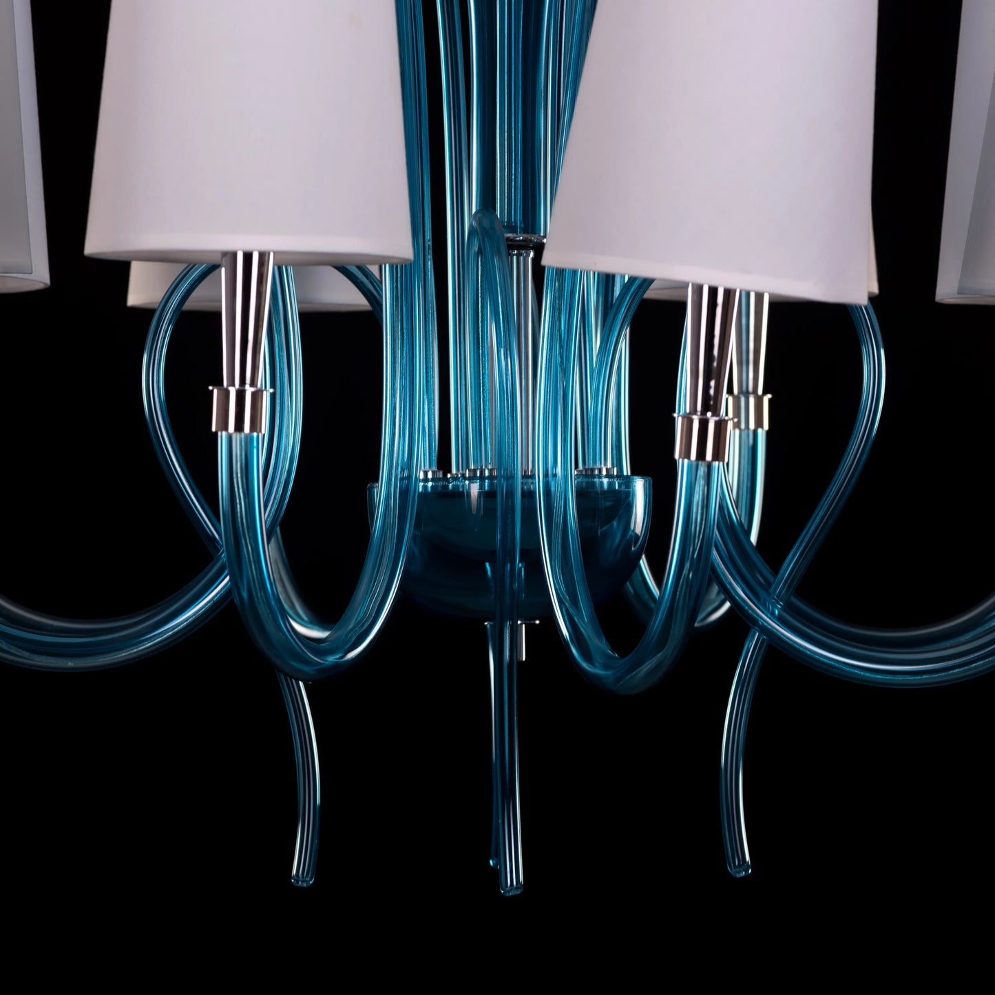 Lunch In London blue and white glass chandelier illuminating an elegant dining room