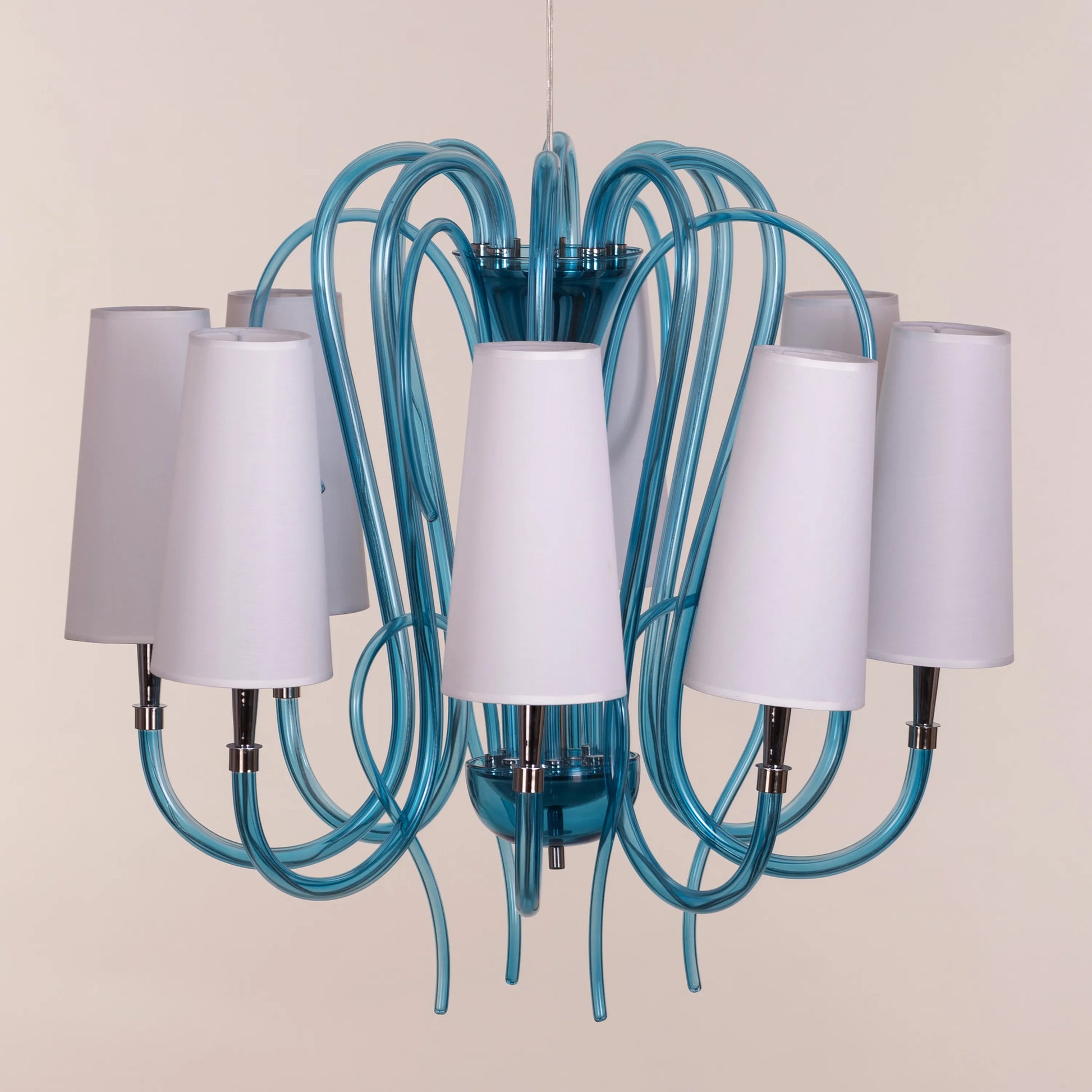 Lunch In London blue and white glass chandelier illuminating an elegant dining room