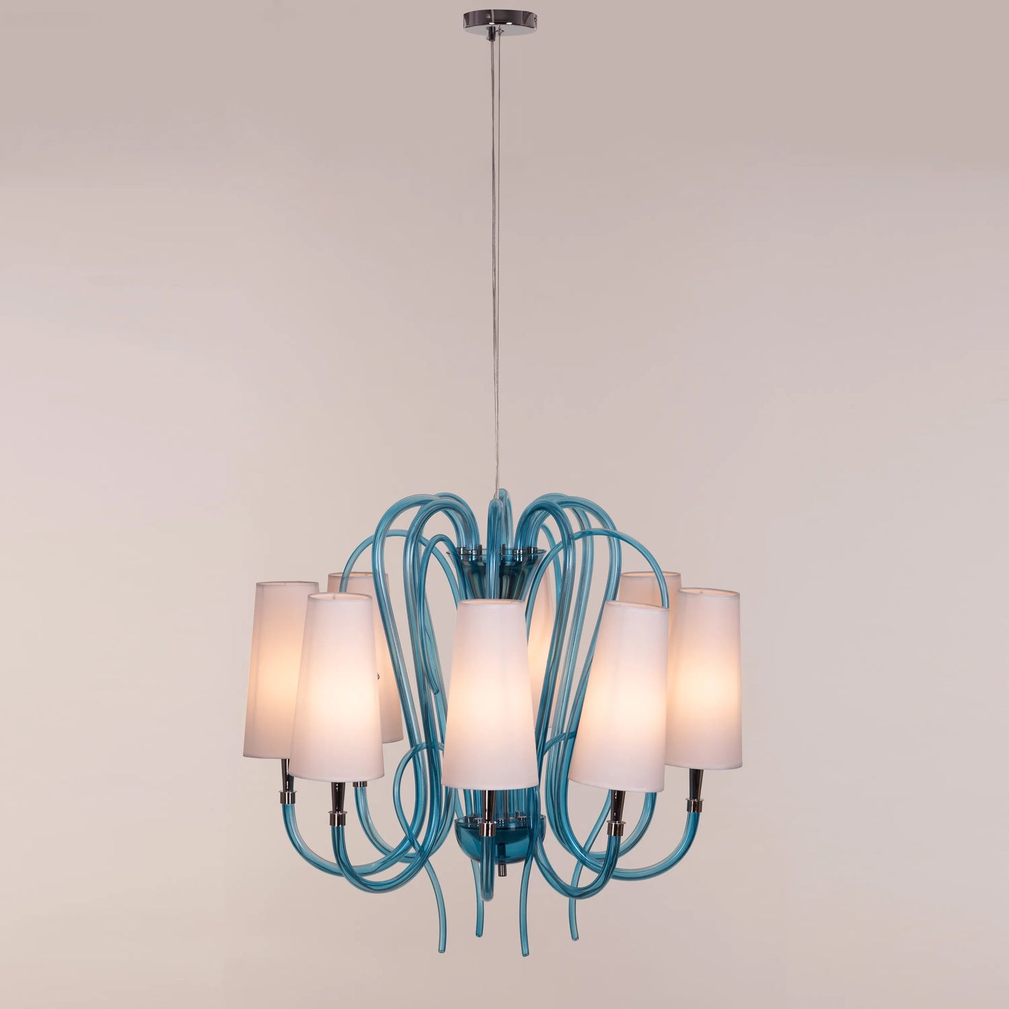 Lunch In London blue and white glass chandelier illuminating an elegant dining room