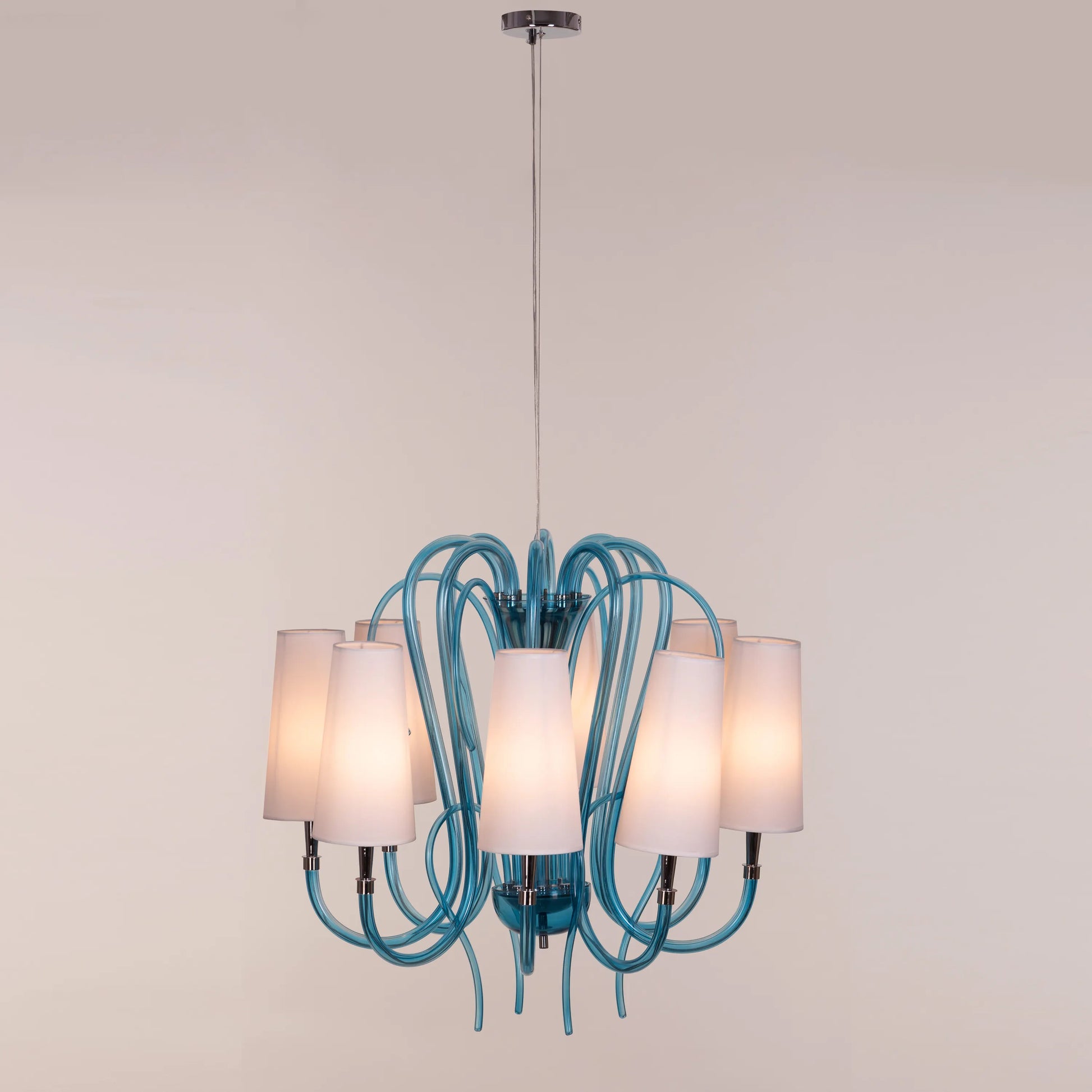 Lunch In London blue and white glass chandelier illuminating an elegant dining room