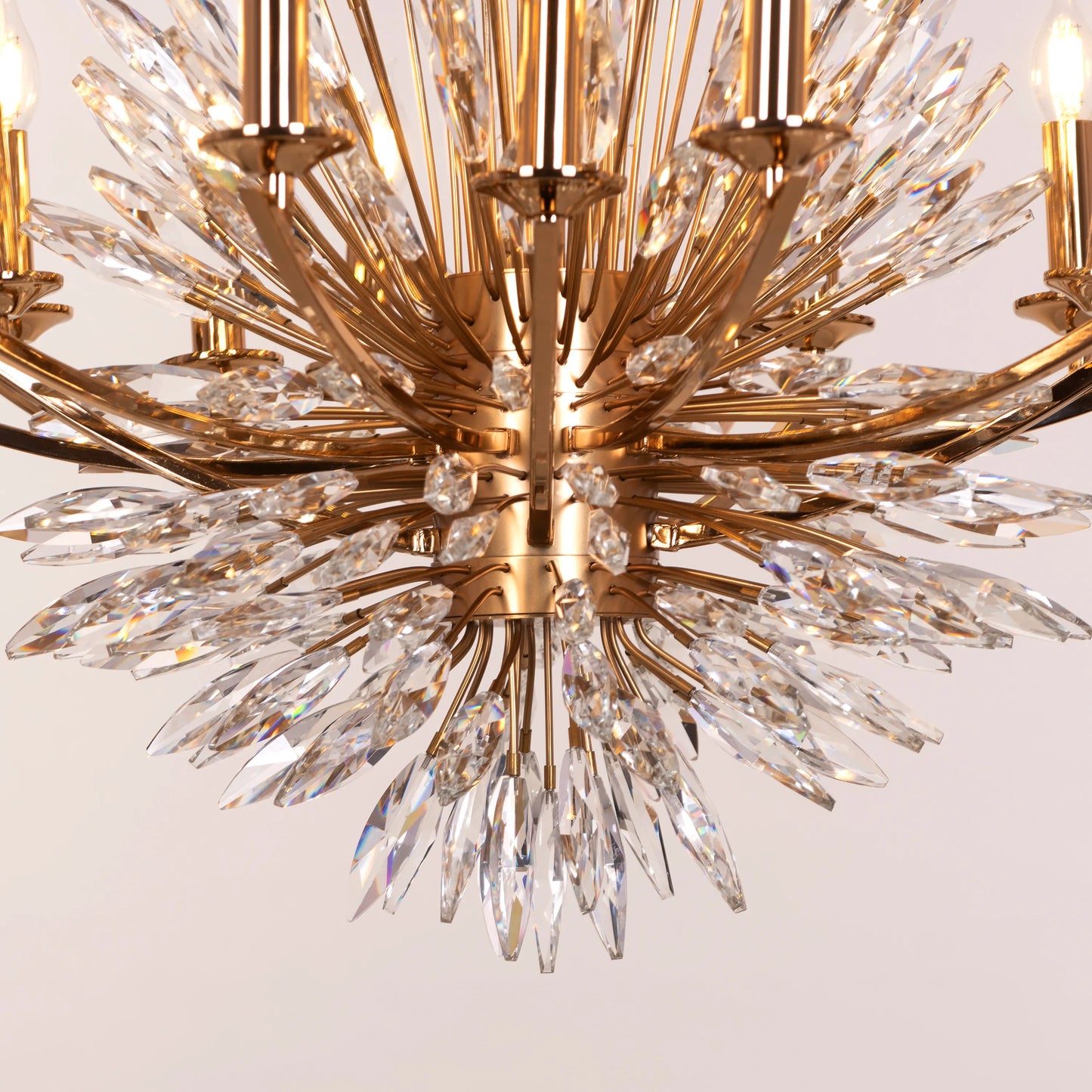 Jewel Of My Heart gold and crystal chandelier illuminating a luxurious master bedroom with its warm, romantic glow