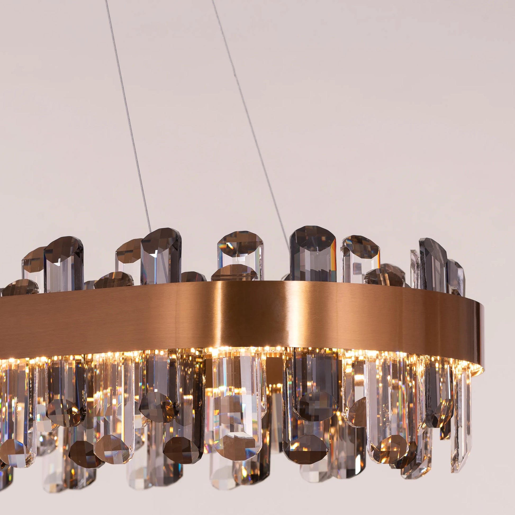 Luxurious gold-finished oval crystal chandelier with dimmable LED lighting