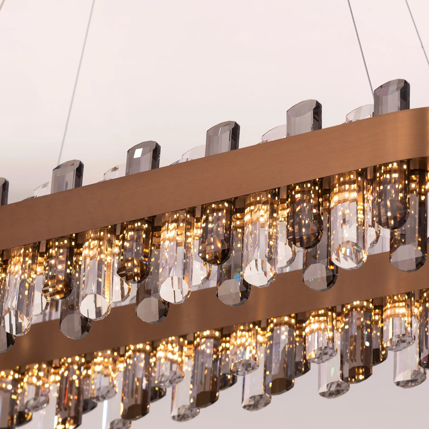 Luxurious gold-finished oval crystal chandelier with dimmable LED lighting