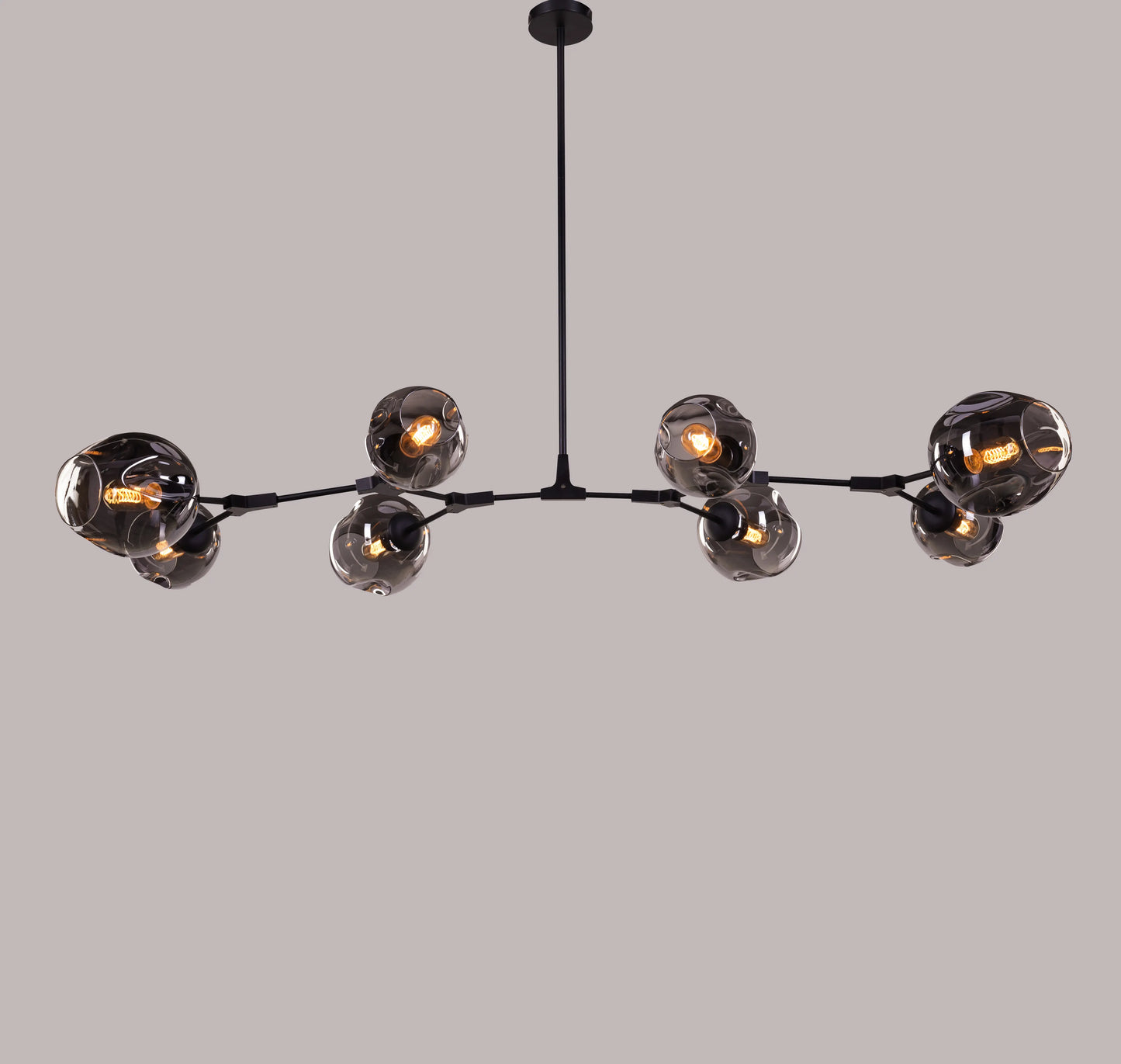 Games People Play (Large, Black, Smokey Grey) Glass Chandelier illuminating a stylish dining room