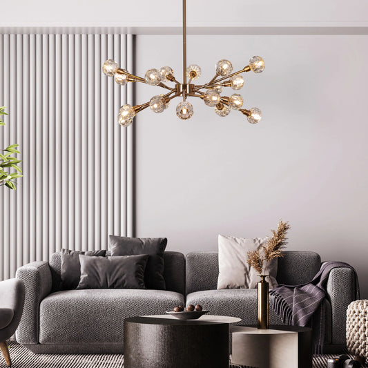 Queen's Necklace medium gold and crystal chandelier illuminating an elegant dining room with its warm, sparkling glow