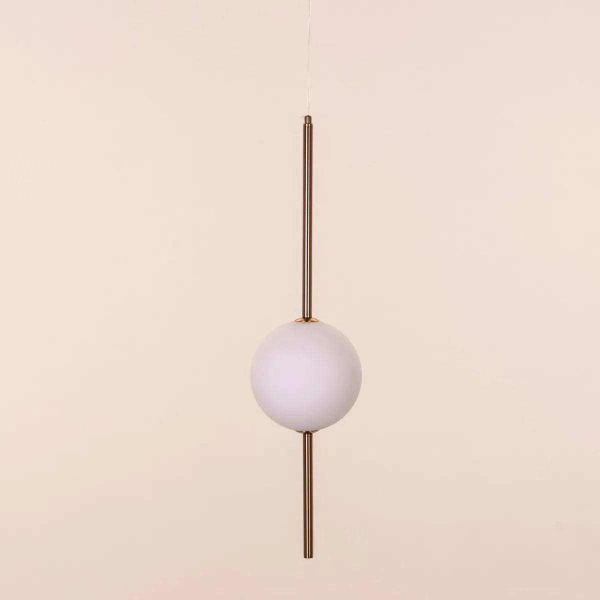 A modern pendant light named 'Peacemaker,' featuring a sleek gold finish and built-in LED lighting. The minimalist design showcases clean lines and a refined silhouette, while the integrated LED provides bright, energy-efficient illumination. This elegant pendant adds a touch of sophistication and warmth to any space, making it a perfect addition to contemporary decor