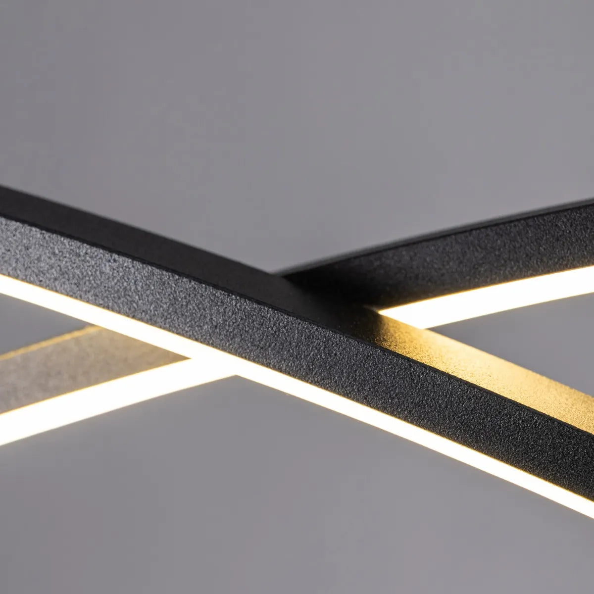 Large black Half Mast chandelier with sleek design and dimmable LED lights