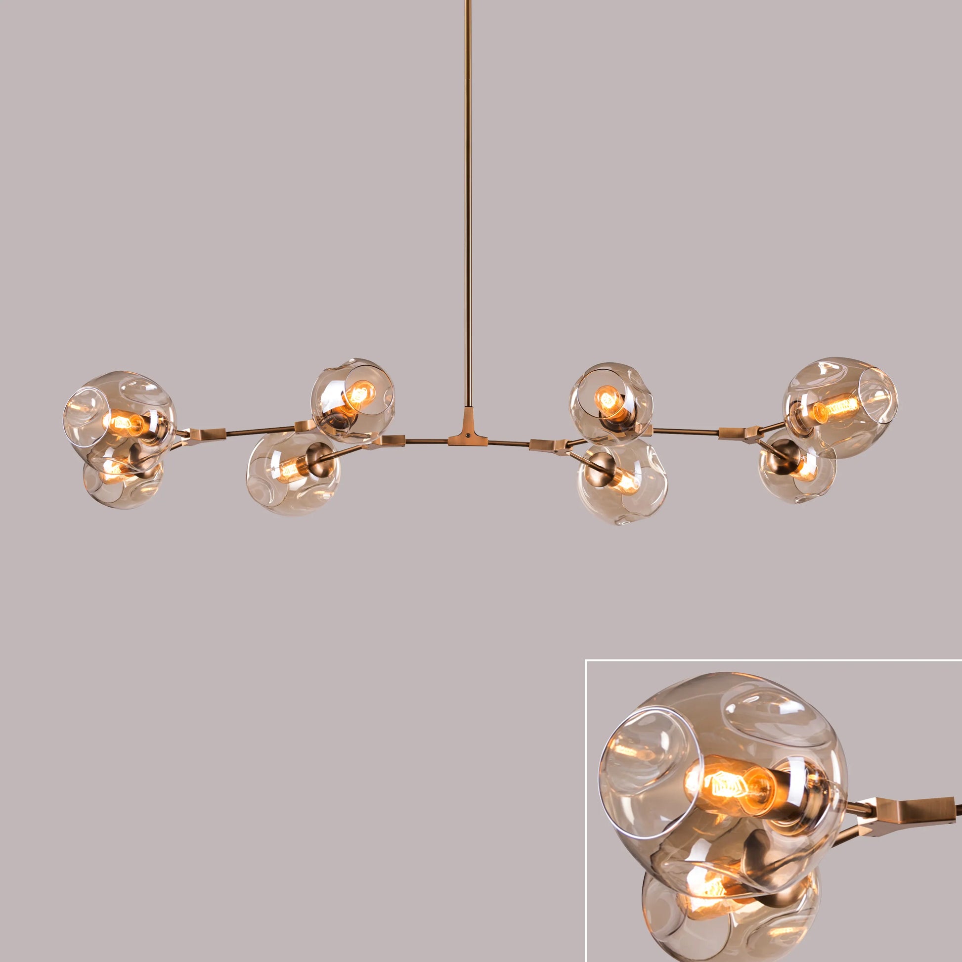 Games People Play Cognac Glass Chandelier with elegant glass shades.
