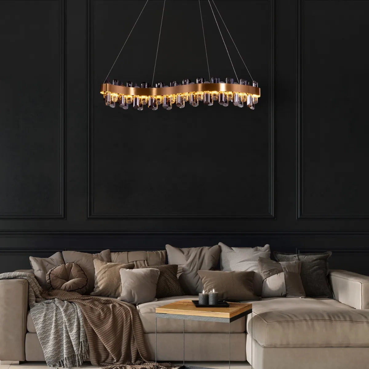 Start From Scratch long crystal chandelier illuminating a grand, open-concept living space