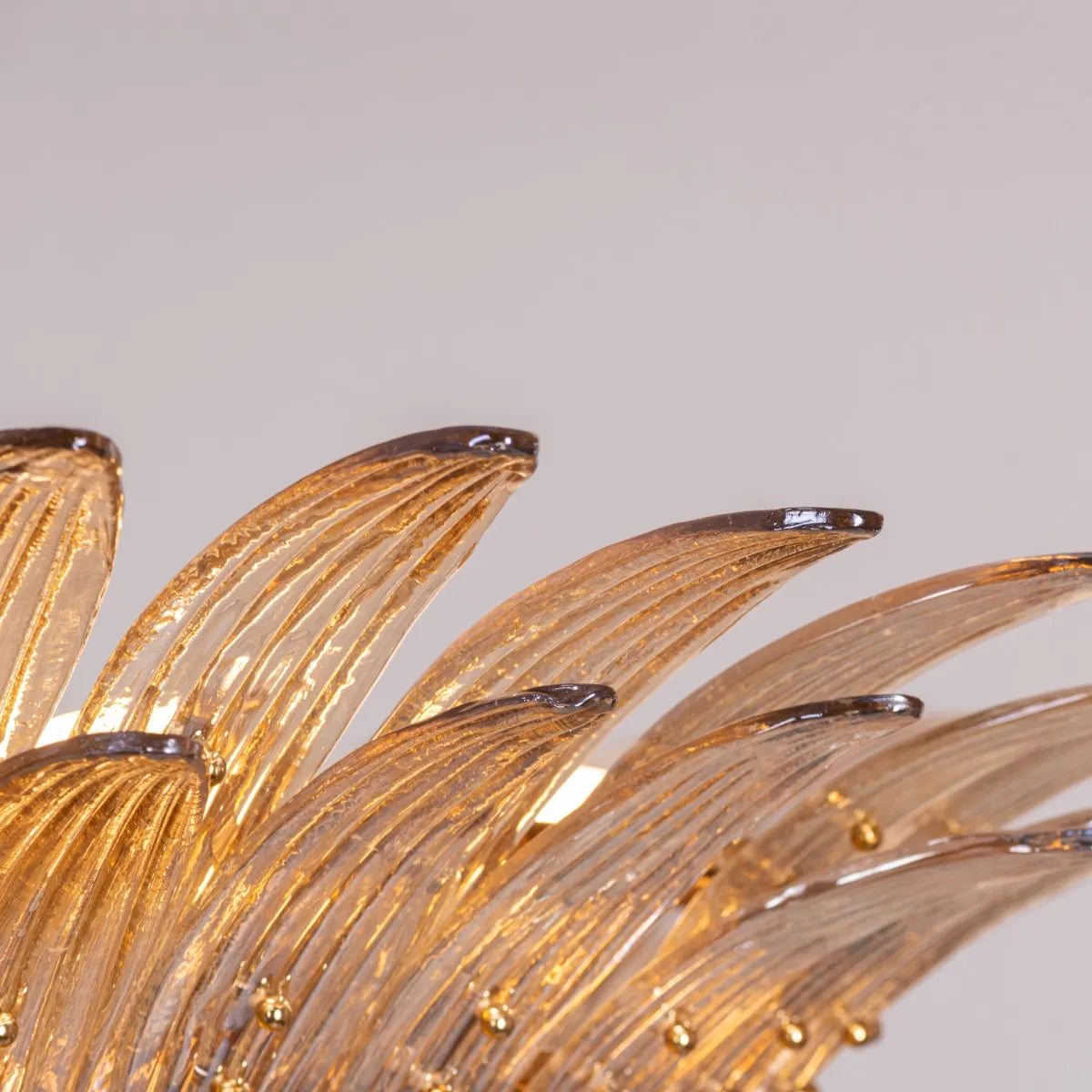 Land This Plane Chandelier suspended in a luxurious living room, its gold framework and glass elements evoking an aircraft's descent.