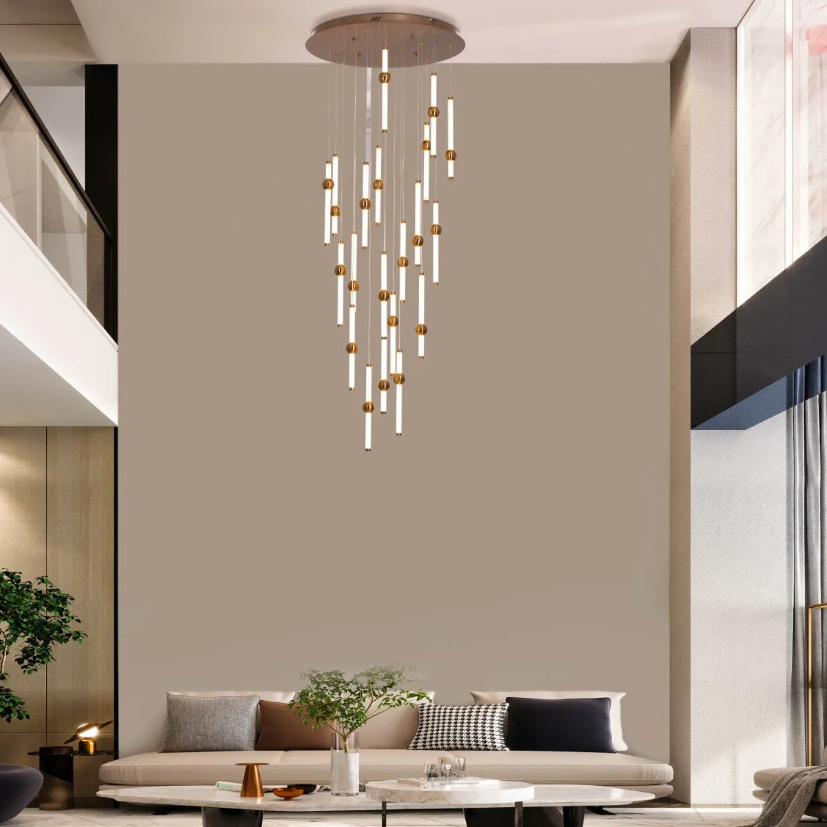 Left On Read double height glass chandelier illuminating a spacious living room