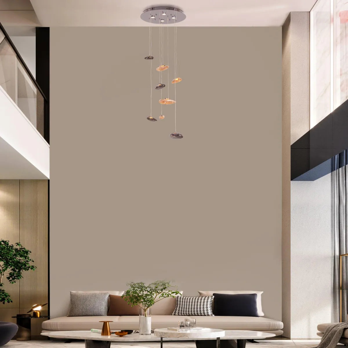 Raise Your Glass Double Height Glass Chandelier illuminating a grand foyer.