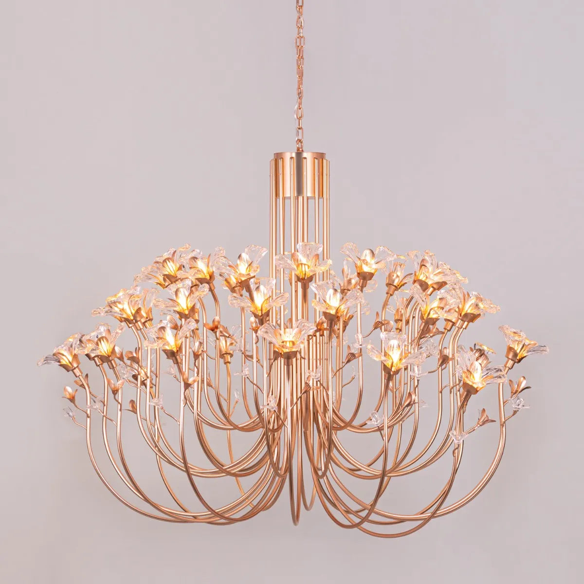 Large gold crystal chandelier with multiple tiers of luxurious sparkle