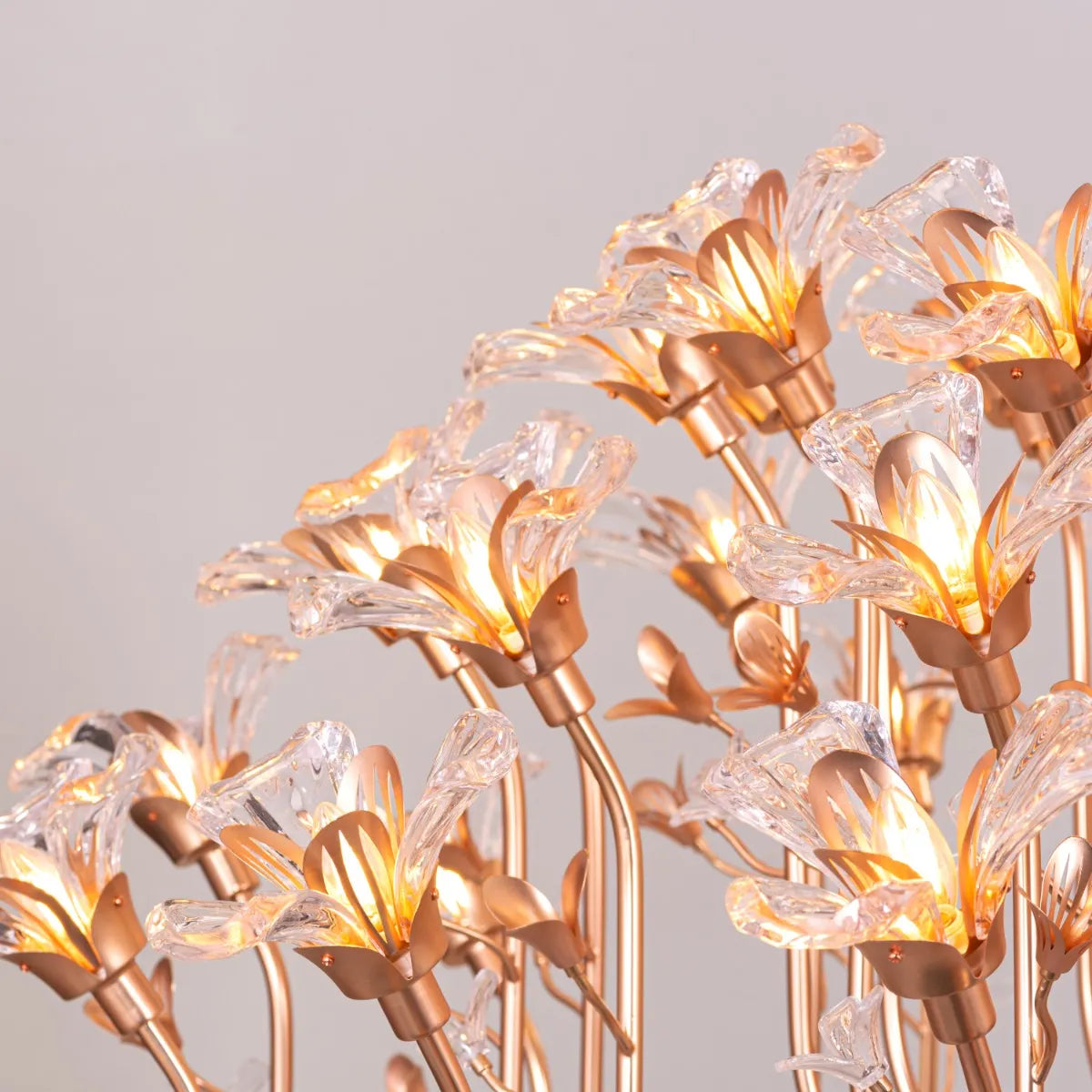 Large gold crystal chandelier with multiple tiers of luxurious sparkle