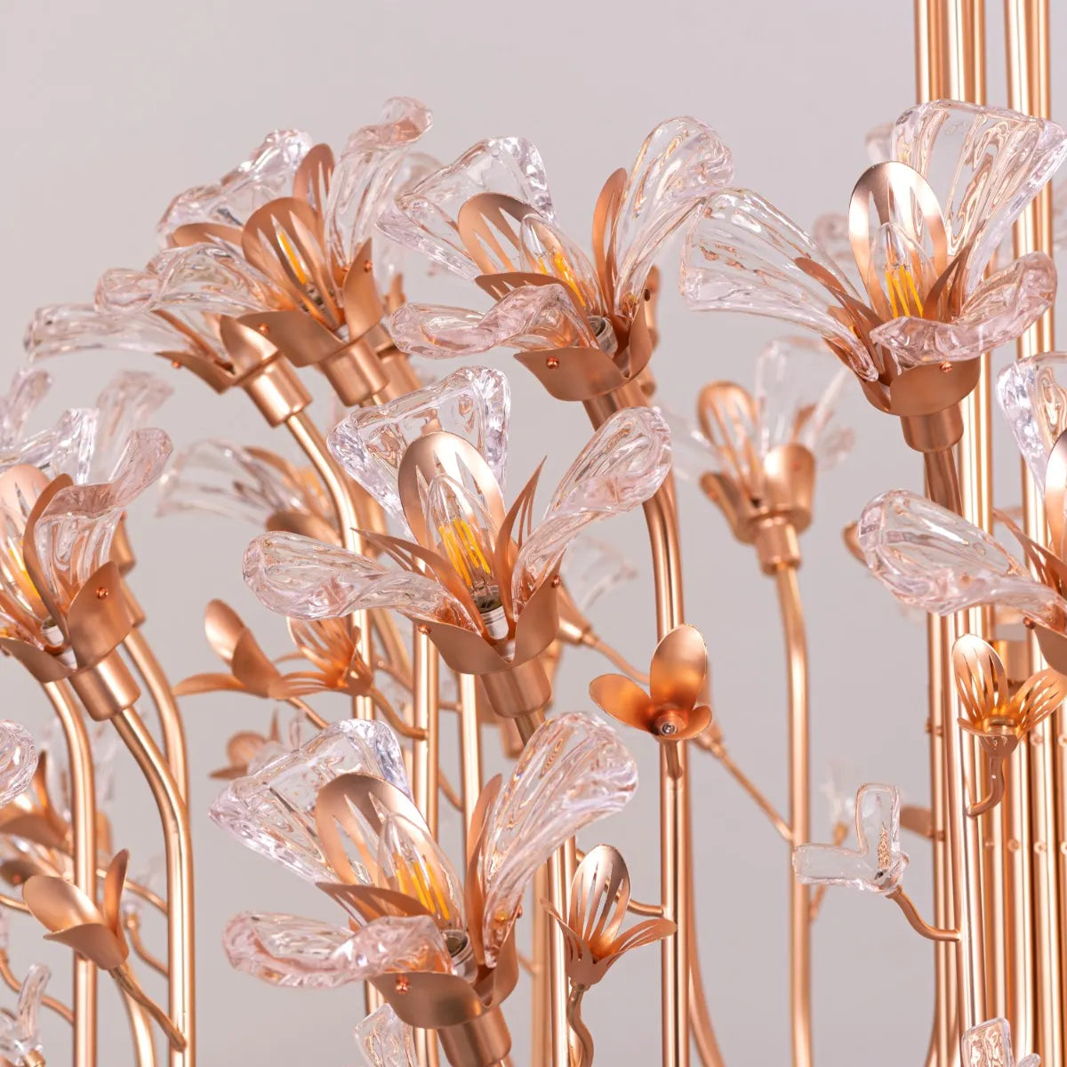 Large gold crystal chandelier with multiple tiers of luxurious sparkle