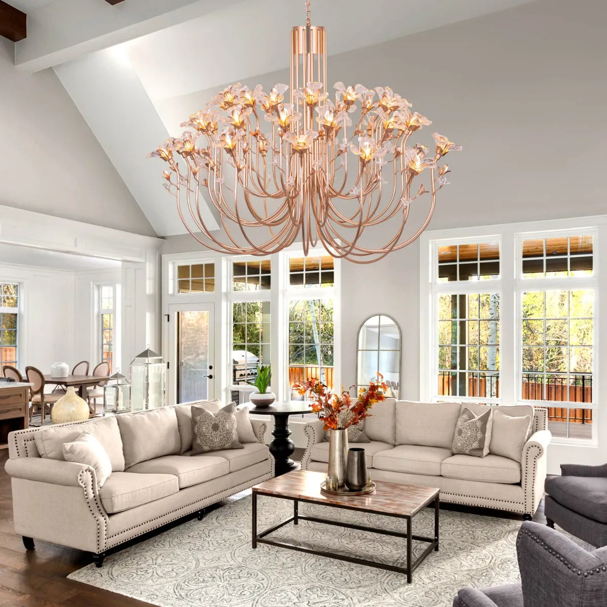 Large gold crystal chandelier with multiple tiers of luxurious sparkle