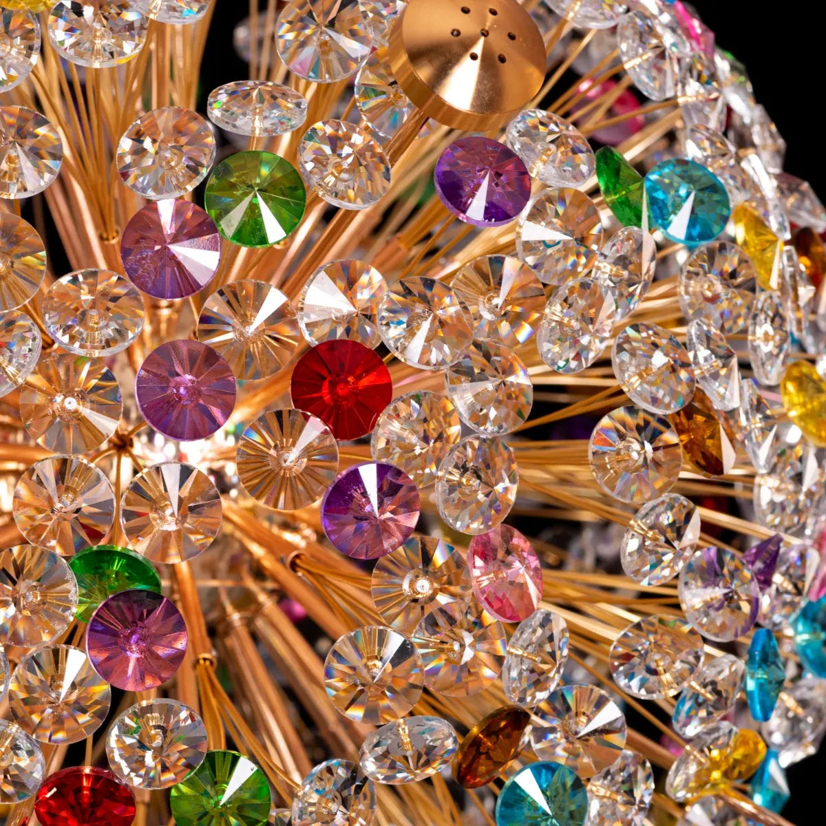 Soaring Crystal Chandelier illuminating a grand foyer with dazzling light.