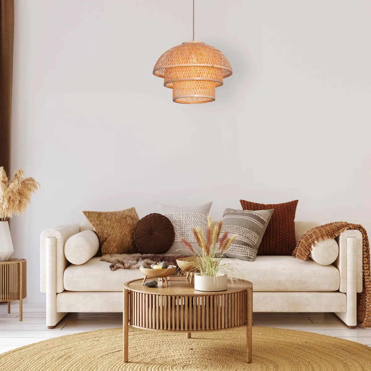 A unique rattan pendant light named 'Never The Same,' featuring a handcrafted, woven rattan shade with an organic, irregular shape. The natural fibers create a warm, inviting glow as light filters through the intricate patterns, offering a bohemian, rustic charm that adds texture and character to any space.