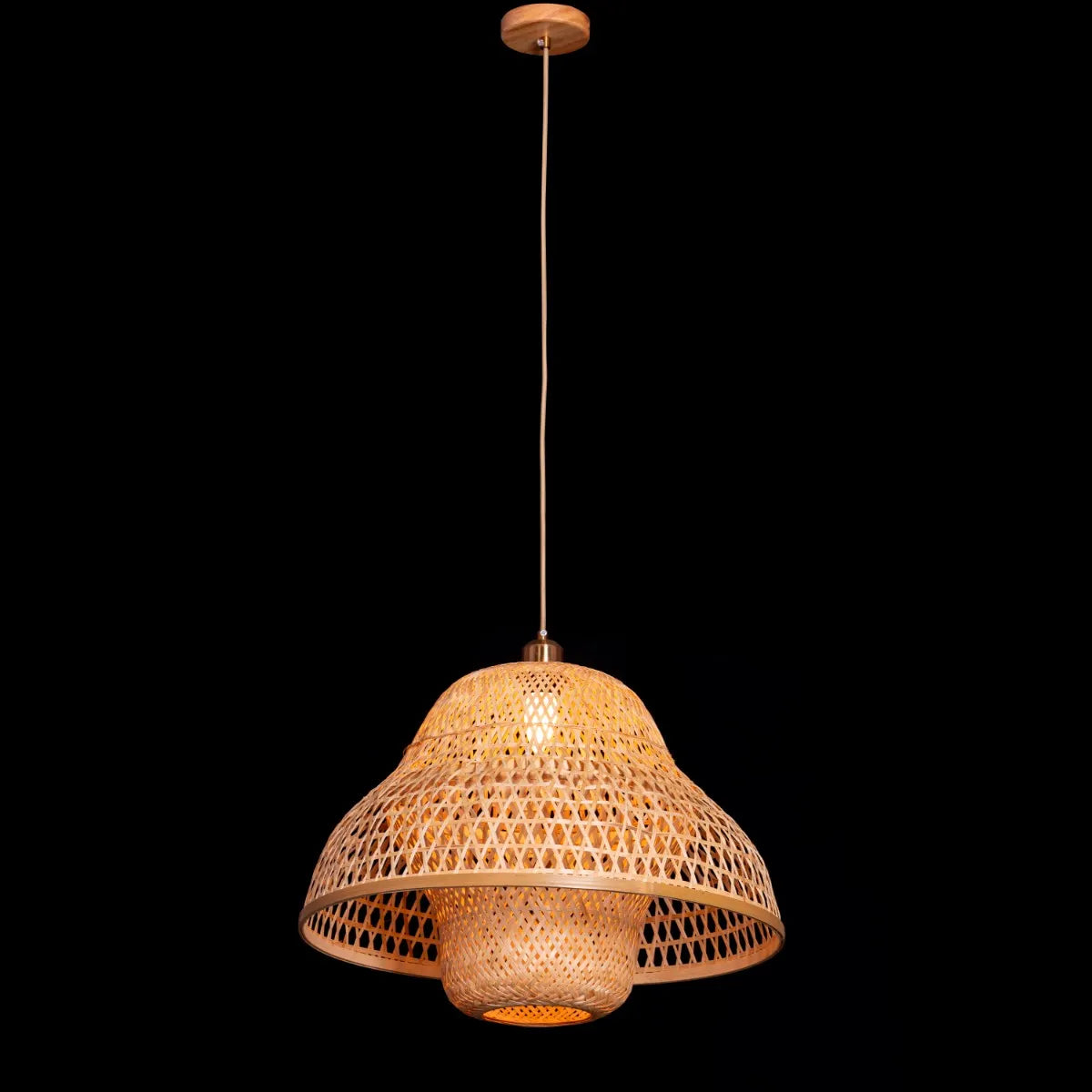 A stylish rattan pendant light named 'Paid The Bill,' featuring a handwoven, spherical rattan shade with intricate patterns. The natural fibers allow light to softly filter through, casting warm, textured shadows. This pendant light blends bohemian charm with modern design, adding a cozy and artistic touch to any room.