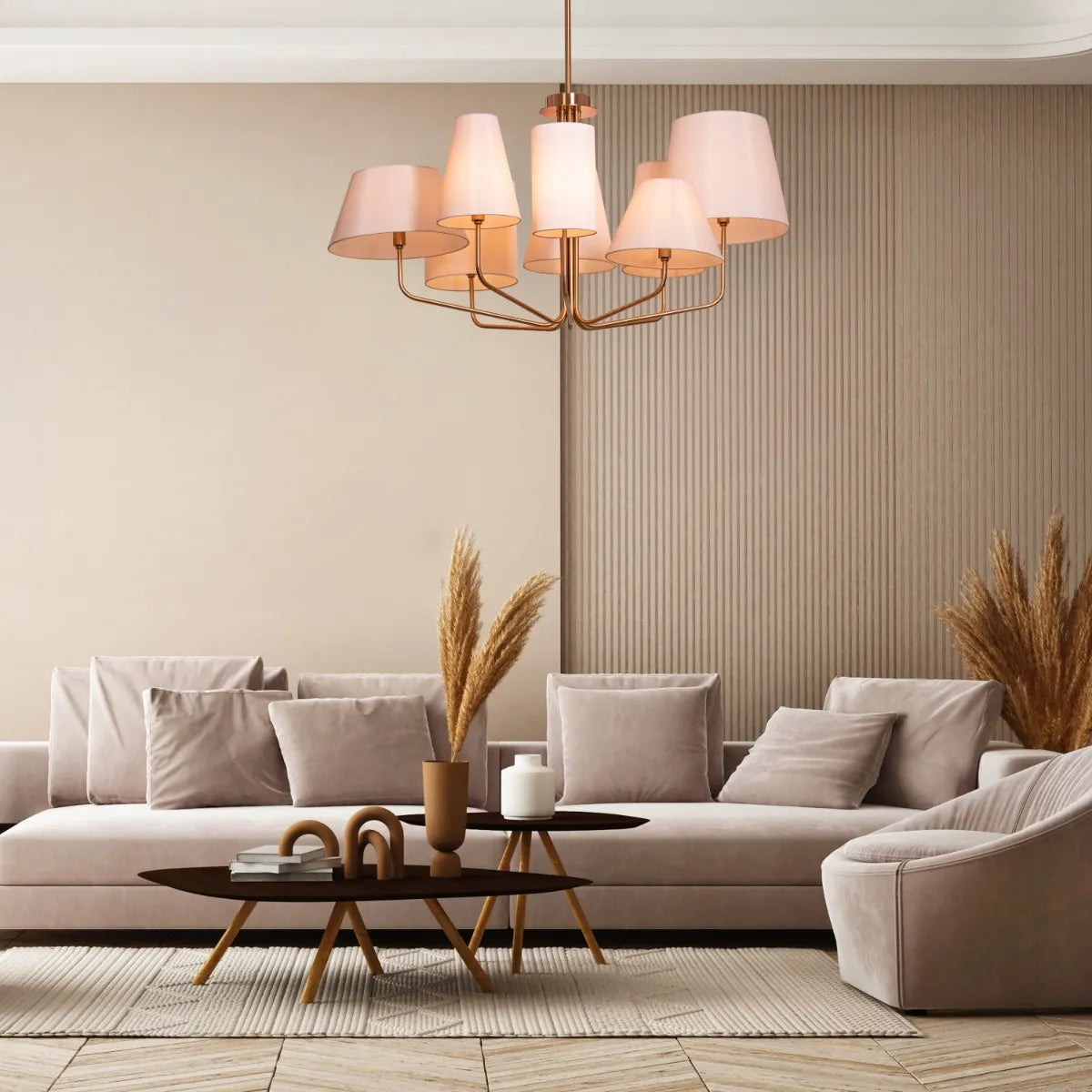 Large gold and beige fabric chandelier with layered shades resembling fluttering pages