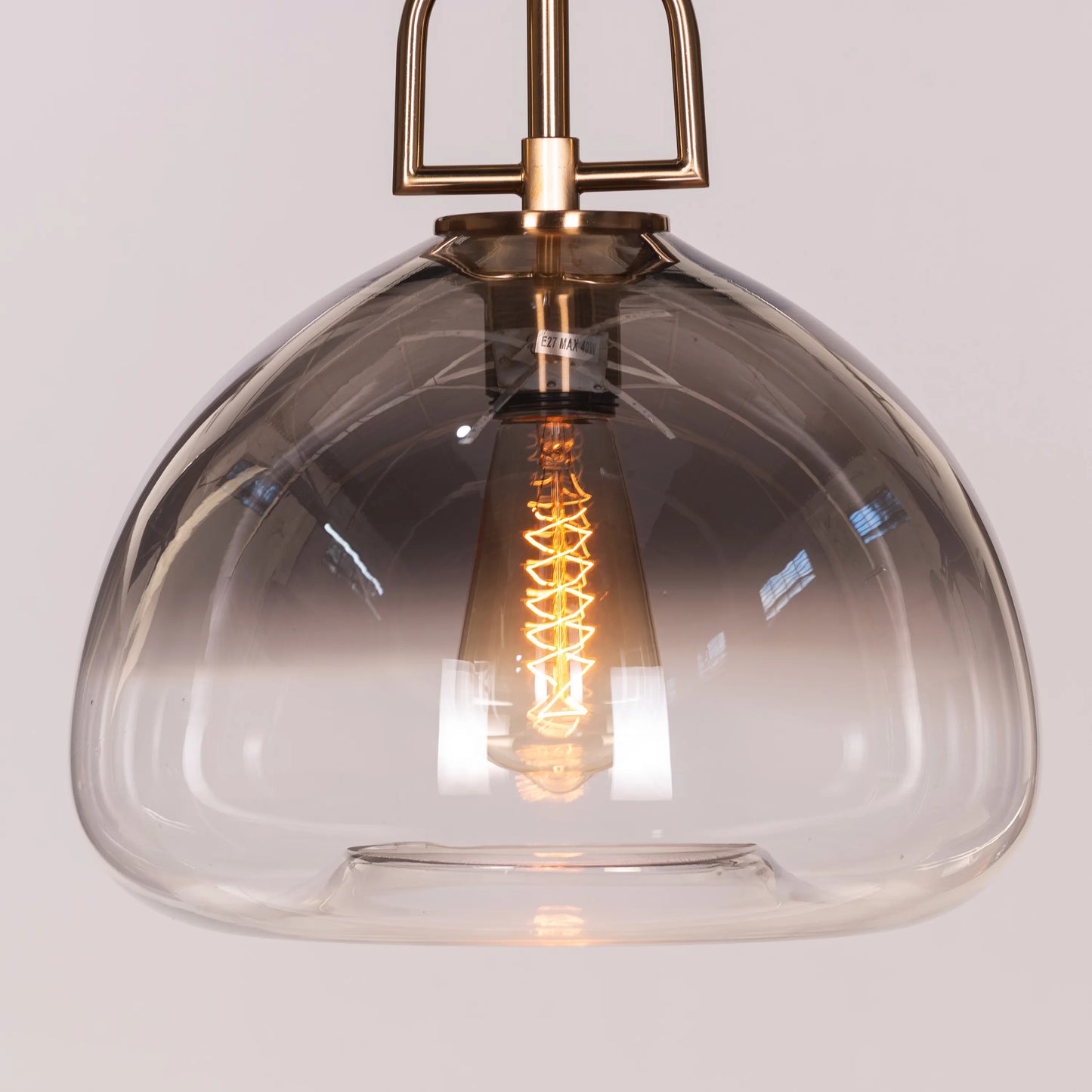 Stylish Nightlife Pendant Light in Clear Glass with Striking Gold and Smokey Grey Elements