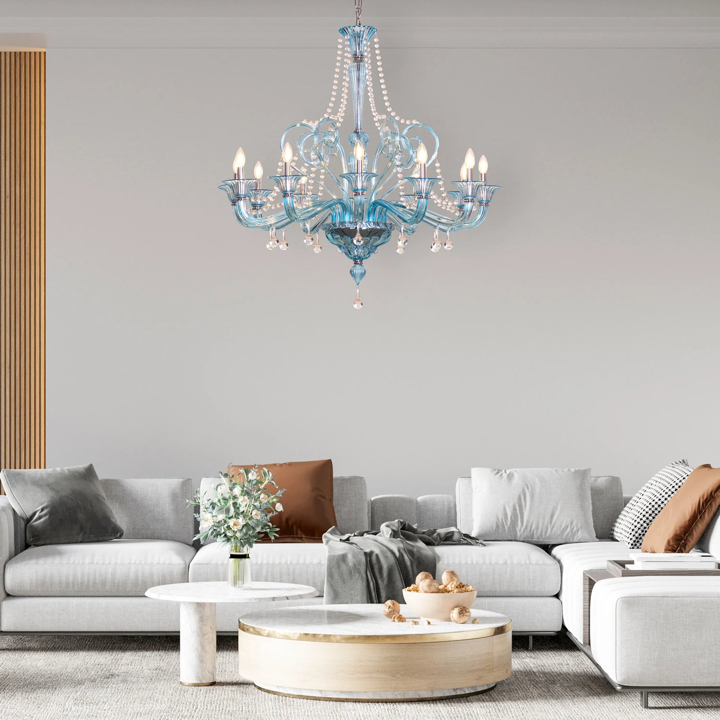 Grecian Glamour large blue textured glass chandelier illuminating a luxurious living room