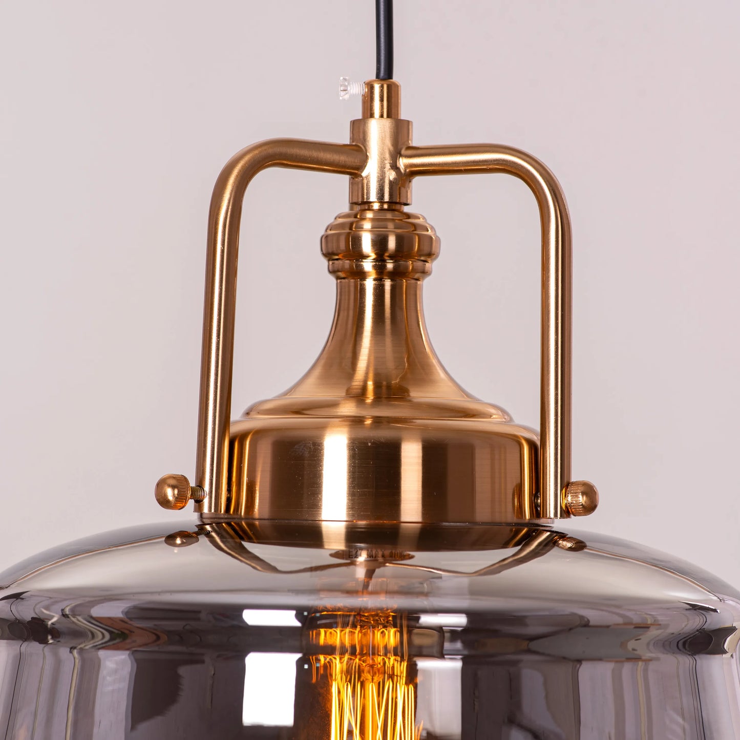 Eyes Closed (Gold, Smokey Grey) Clear Glass Pendant Light