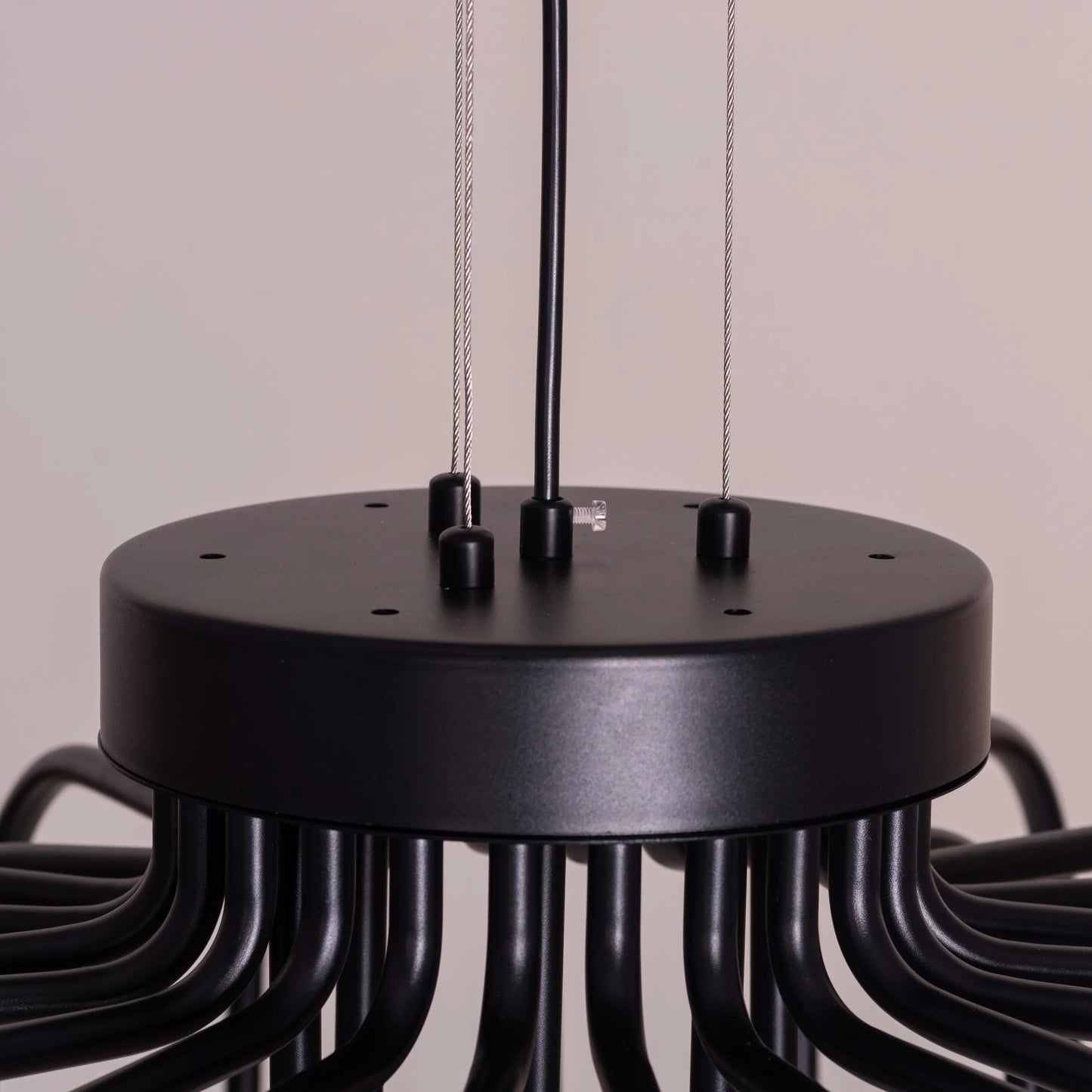 Queen Of Chaos black chandelier with built-in LED lighting.