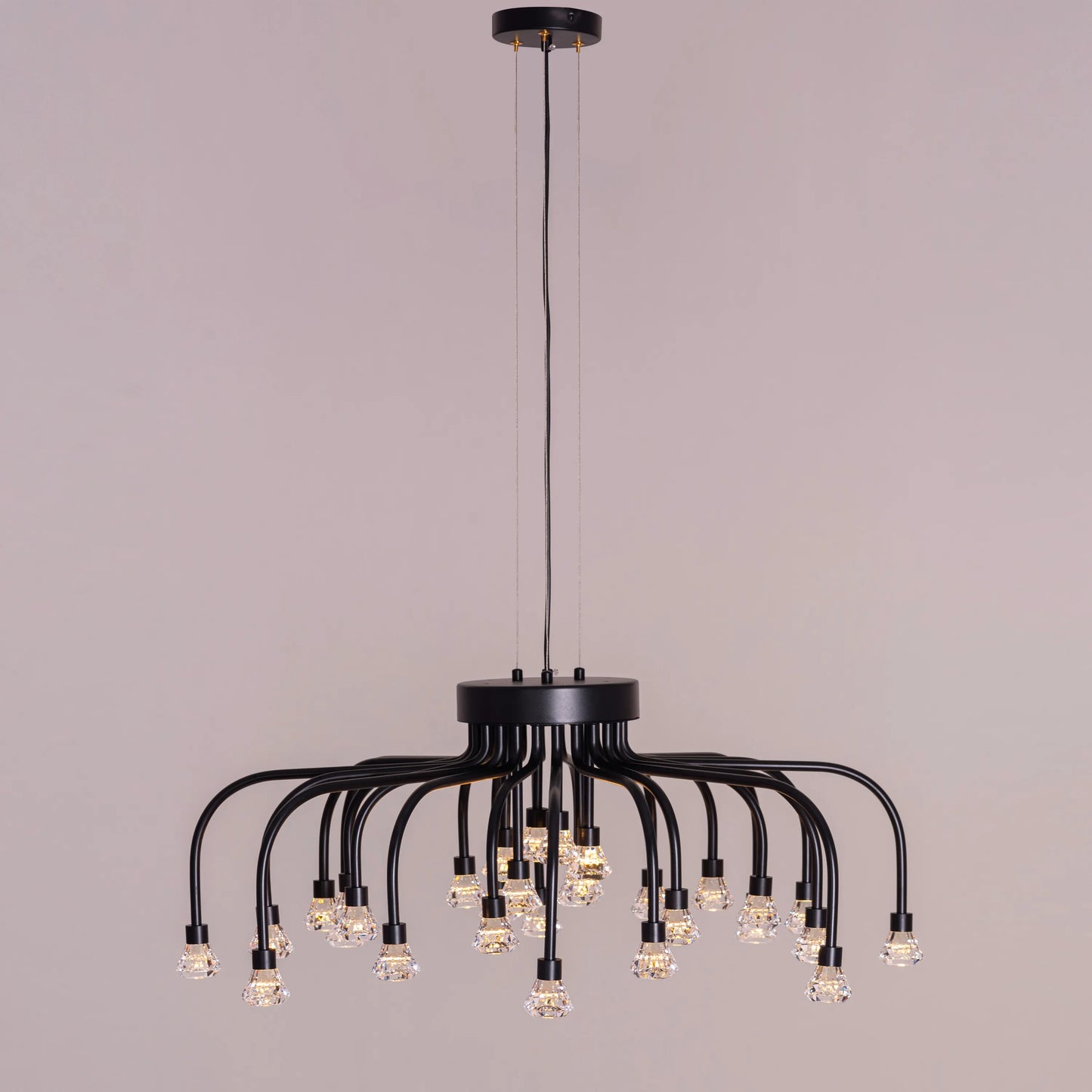 Queen Of Chaos black chandelier with built-in LED lighting.