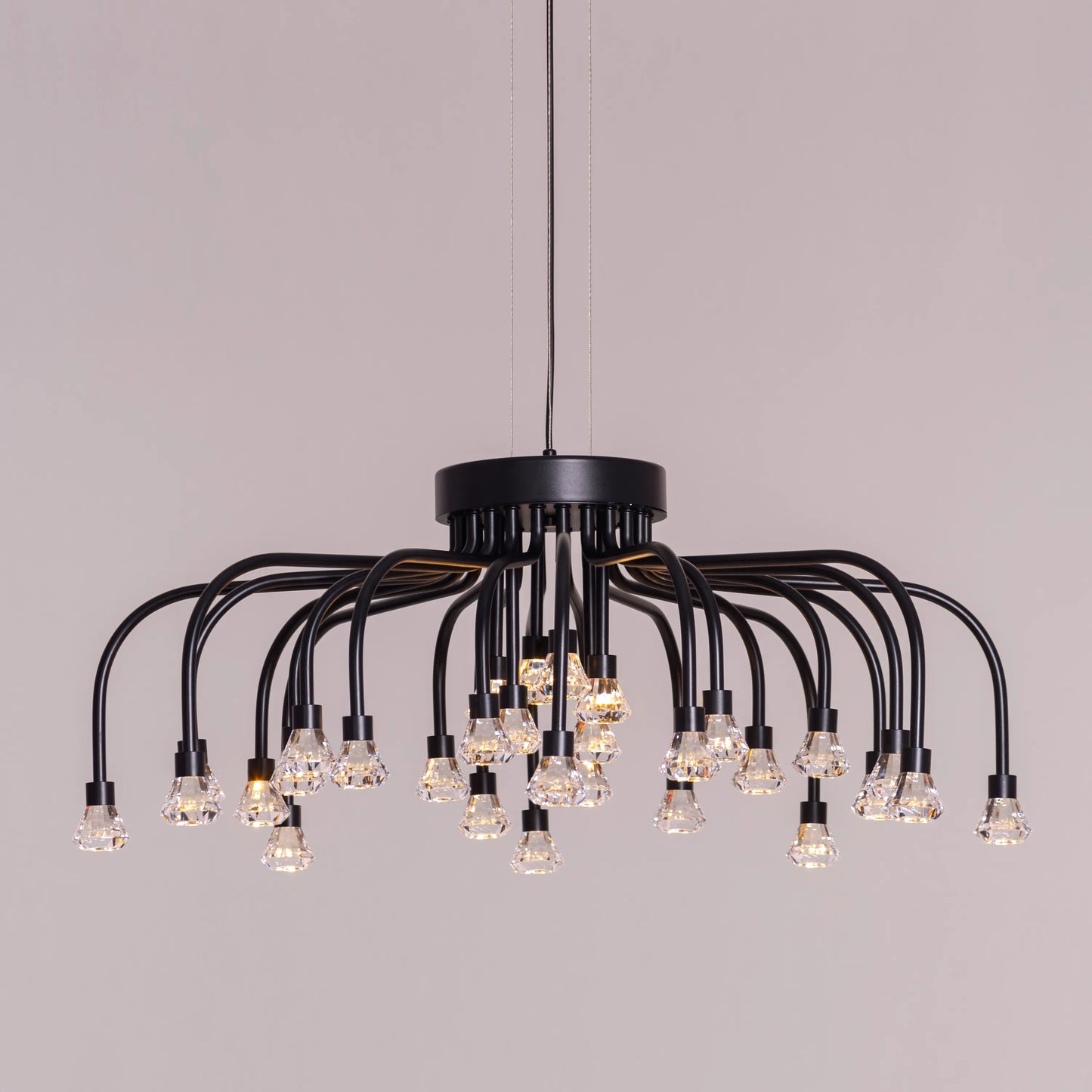Queen Of Chaos black chandelier with built-in LED lighting.