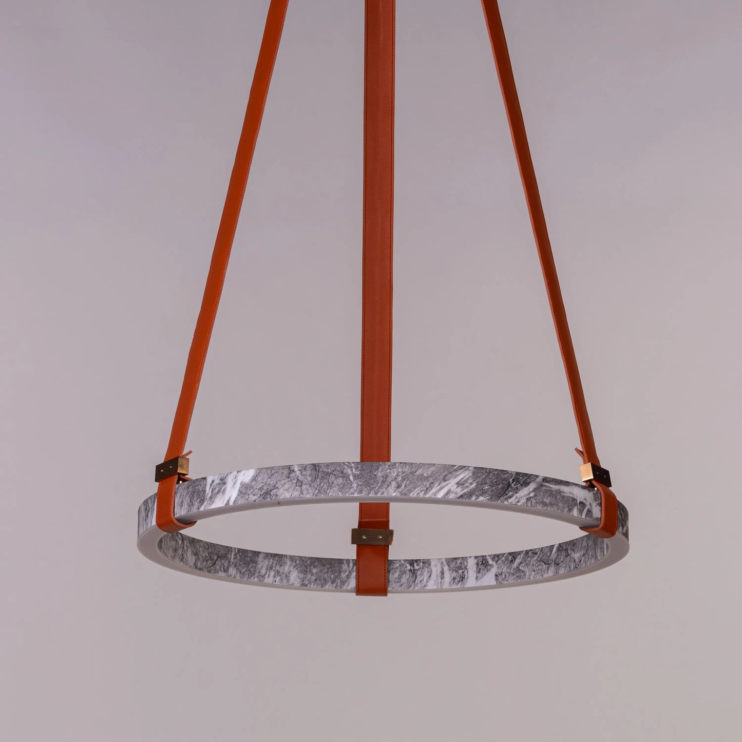 Round grey LED chandelier with slim profile suspended in a modern living room