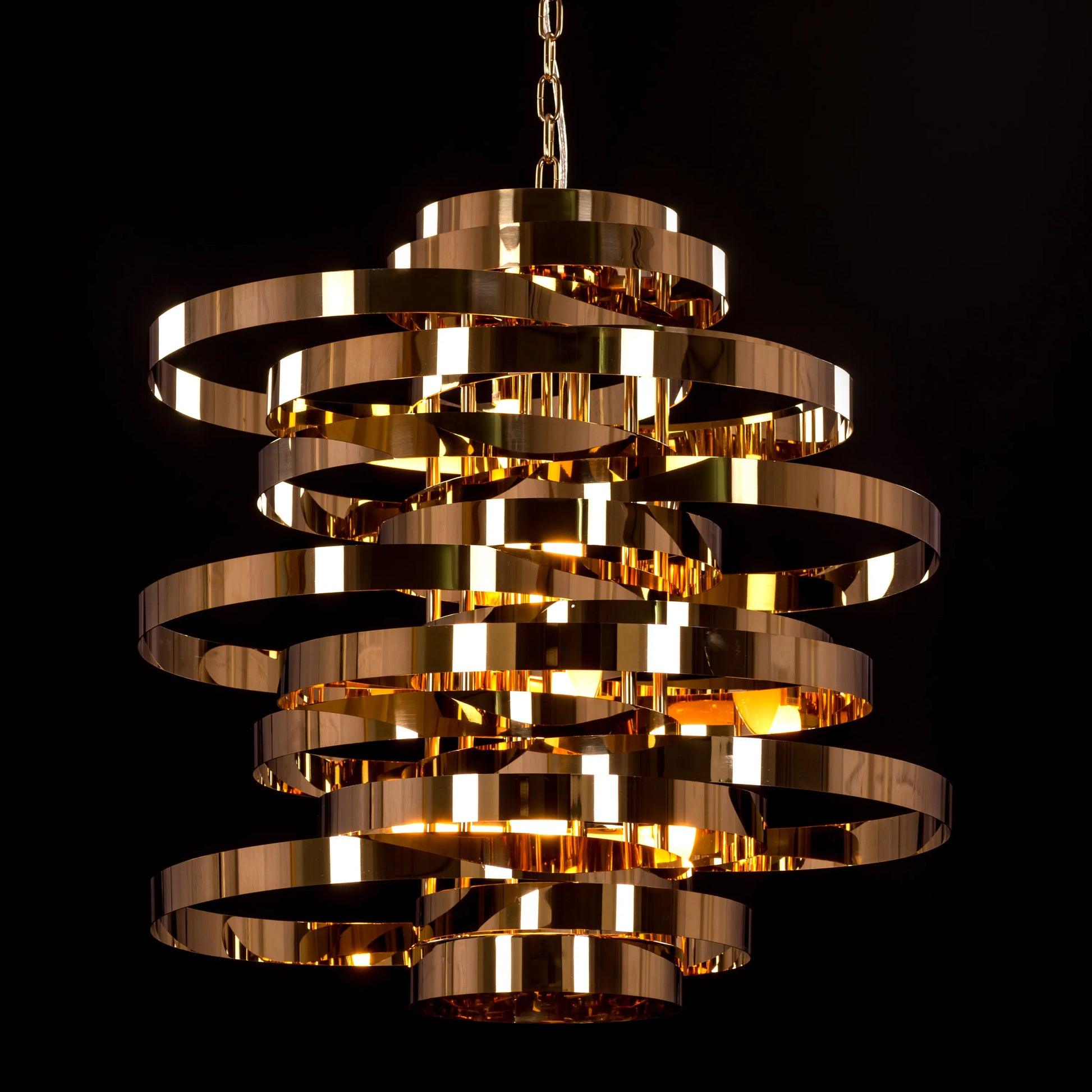 Heaven and Earth Grand chandelier in luxurious metallic tones.