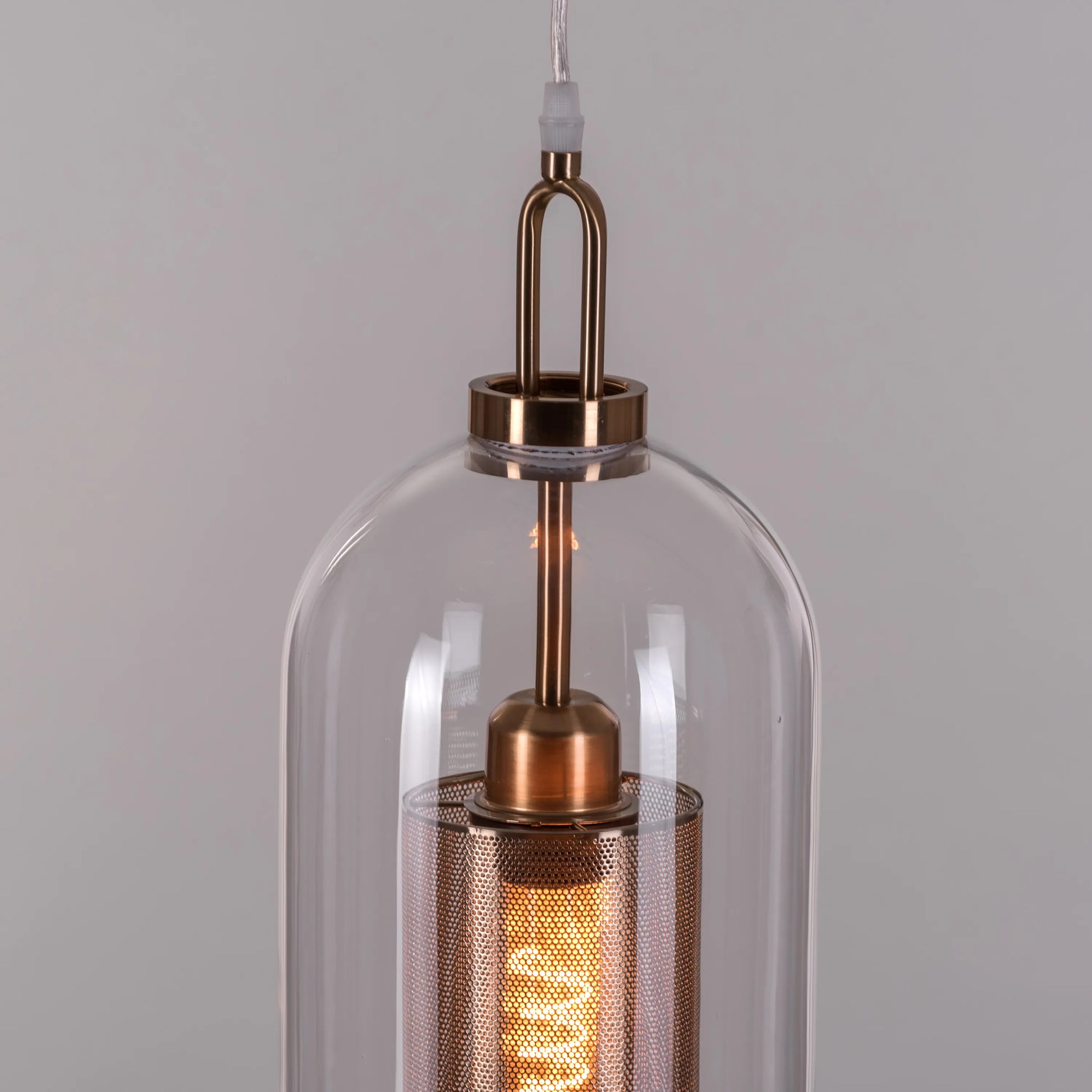 Sophisticated Good To Glow Pendant Light Featuring Long Clear Glass and Gold Finish